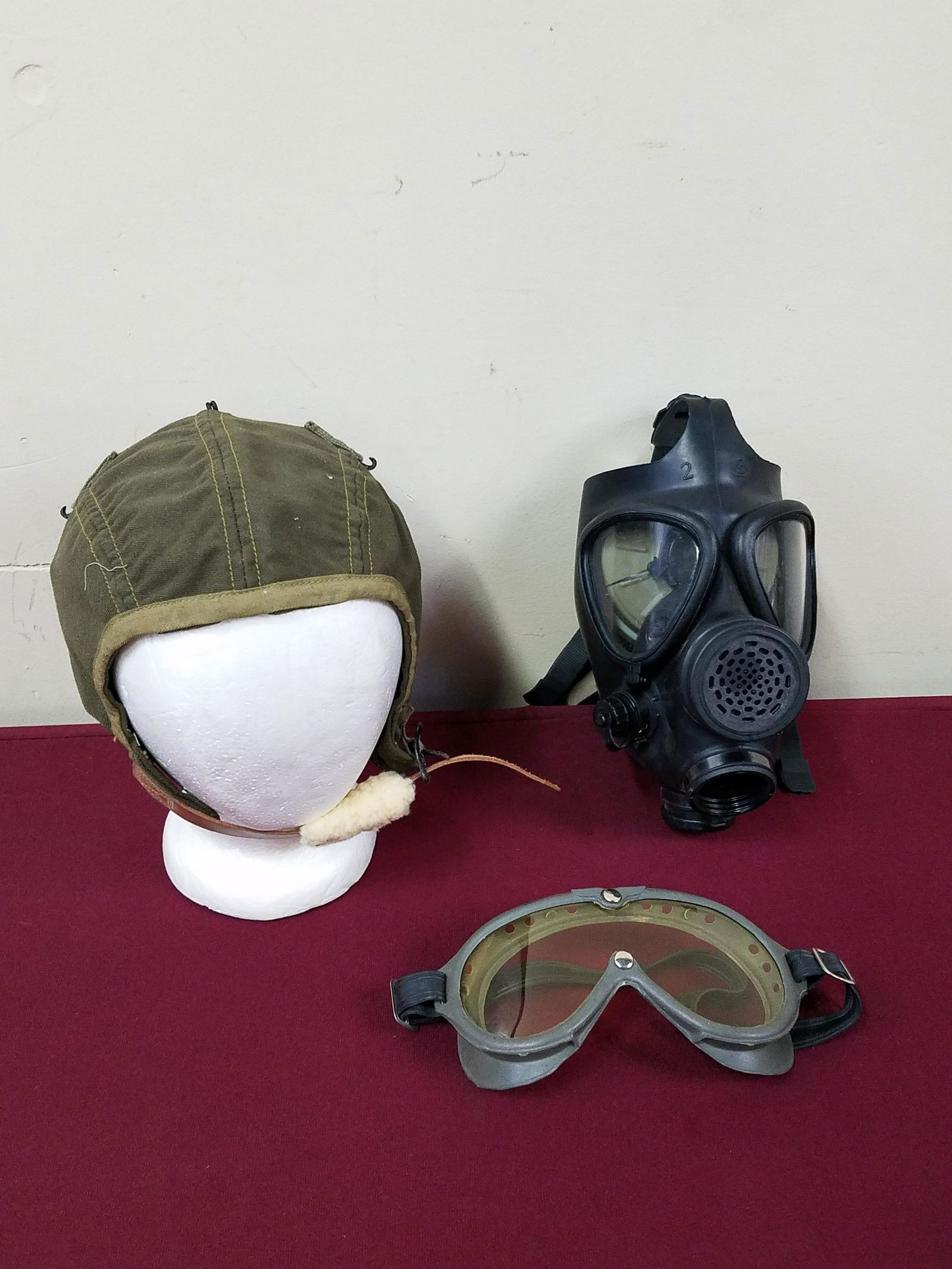 Flying Helmet, Gas Mask and Ideal Goggles: Includes a summer A-9 flying helmet, Ideal goggles with extra lenses and Israeli M-15 gas mask. IMPORTANT: Before bidding, please read the terms and conditions below. When you registered for the aucti