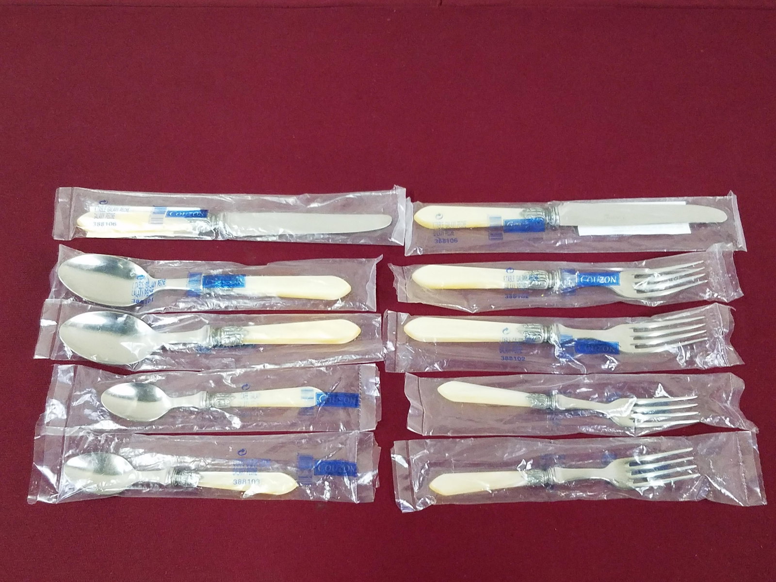 10 Pcs Jean Couzon MOP Galaxy Pearl Flatware: Stainless steel. In original wrapping. IMPORTANT: Before bidding, please read the terms and conditions below. When you registered for the auction you agreed to these terms and will be required to comp