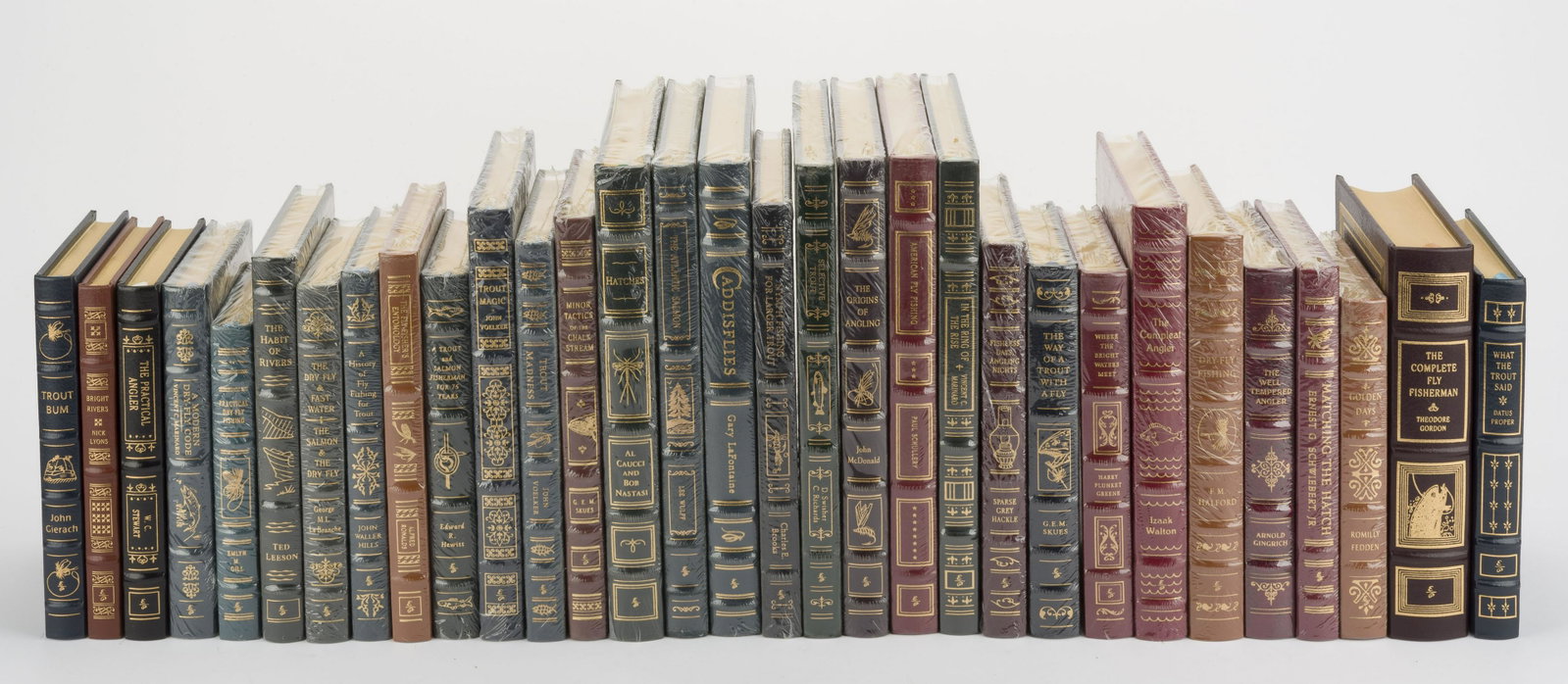 31 Collector's Edition Books on Fishing: DESCRIPTION: Thirty-one leather bound collector's edition books on fishing. Published by Easton Press: Norwalk, Connecticut. Includes "A History of Fly Fishing for Trout", "The Fly-Fisher's Entomology