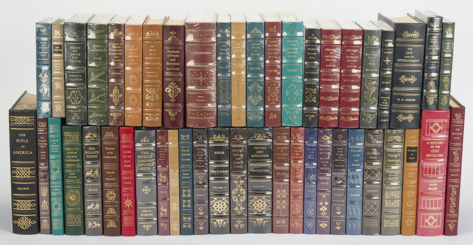 48 Firearms Classic Library Special Edition Books: DESCRIPTION: Forty-eight leather bound Firearms Classic Library Special Edition books. Published by Odysseus Editions, Inc. and Palladium Press. Includes "Sixguns and Bullseyes & Automatic Pistols", "