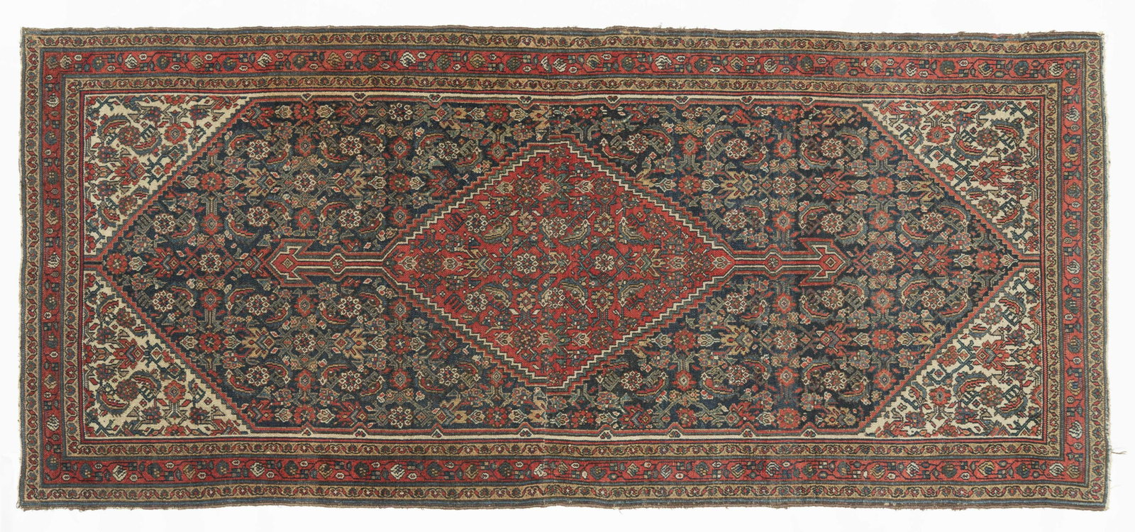 Persian Bibikabad Area Rug: DESCRIPTION: Persian Bibikabad area rug. Iran, 1950's. Dark blue ground with red border. MEASUREMENTS: 8' 2-1/2" x 3' 7". CONDITION: Loss along border with repairs to stitching. Seam to center. IMPORT