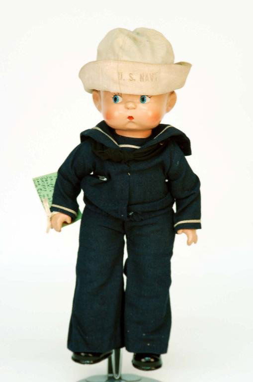 Effanbee Skippy Navy Doll Circa 1935: DESCRIPTION: An Effanbee Skippy Navy doll. Composition swivel head. Cloth body with composition arms and legs with molded shoes. Original outfit. Back of head marked "Effanbee Skippy". ED-145. PROVENA