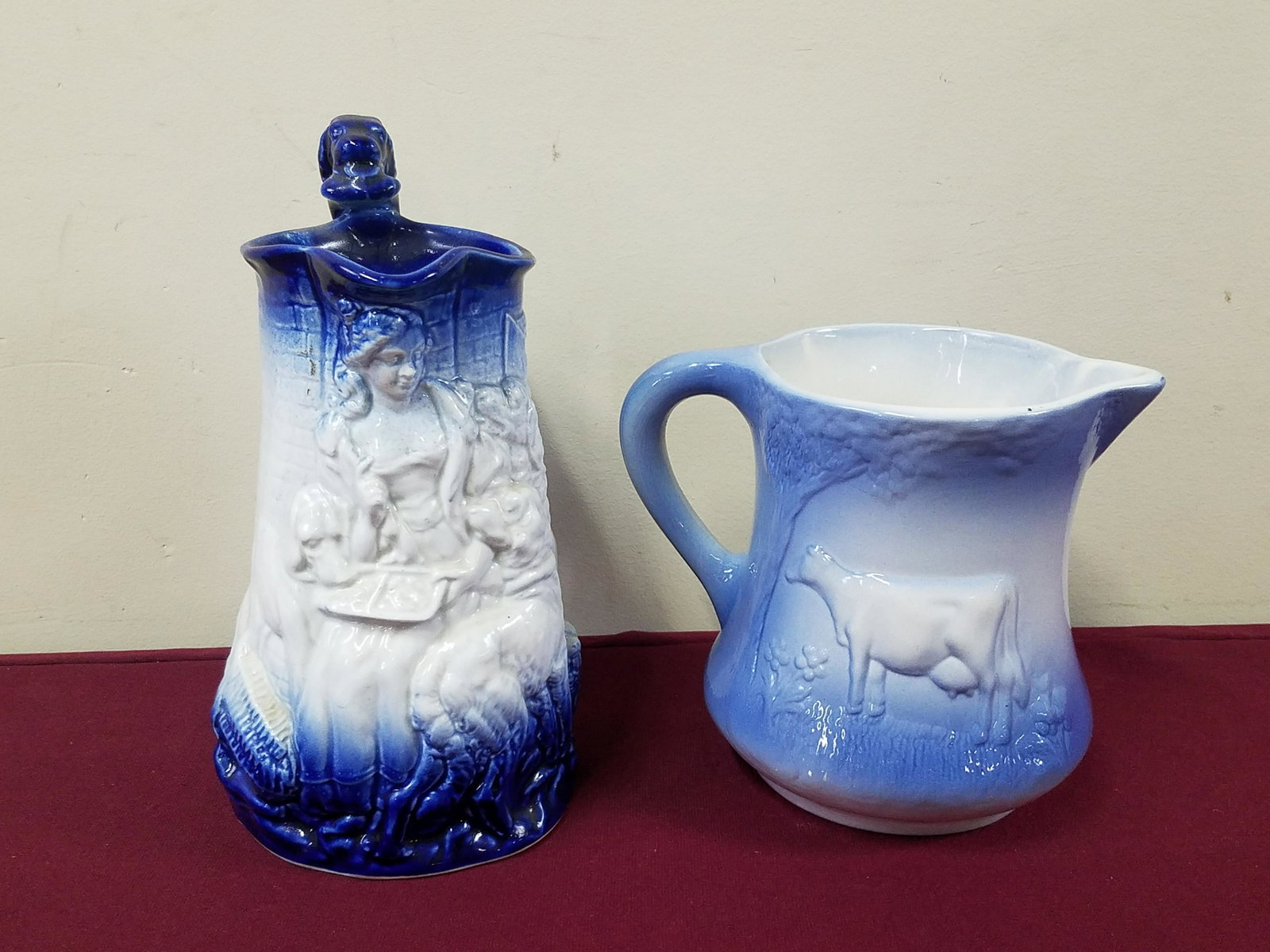 2 Ironstone Pitchers: 6-1/2" to 9-3/4" high. IMPORTANT: Before bidding, please read the terms and conditions below. When you registered for the auction you agreed to these terms and will be required to comply with them.