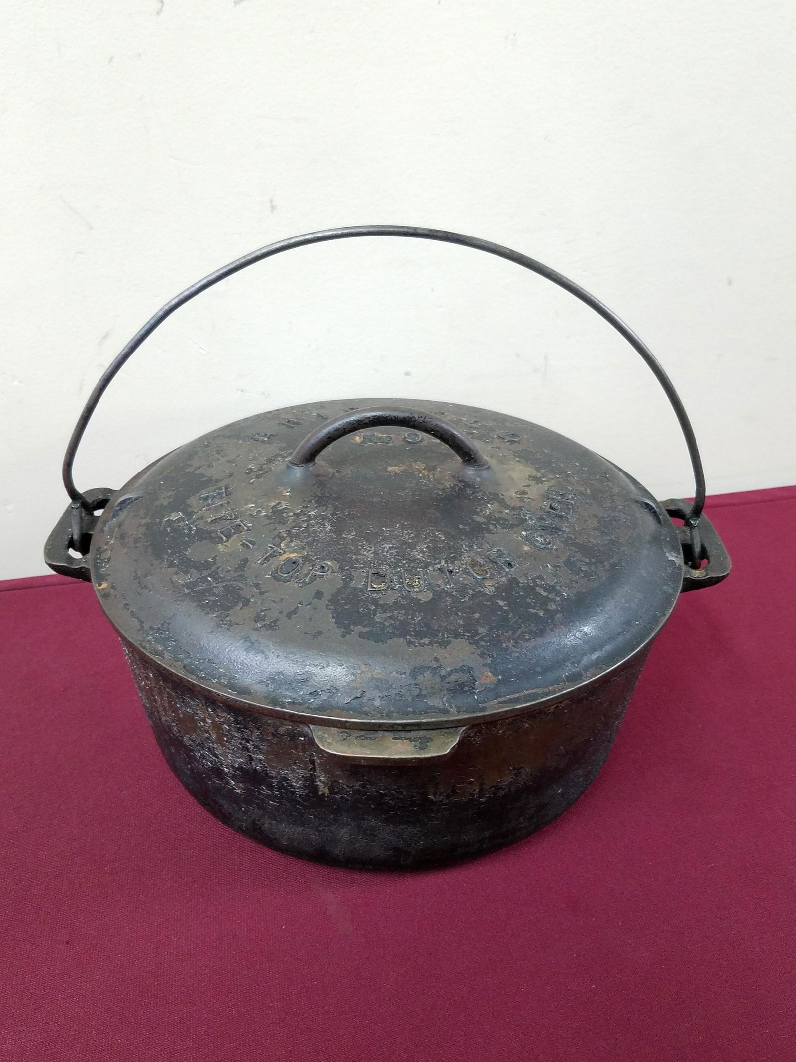 Griswold Tite Top Dutch Oven: No. 9. 13" diameter x 7" high. IMPORTANT: Before bidding, please read the terms and conditions below. When you registered for the auction you agreed to these terms and will be required to comply with