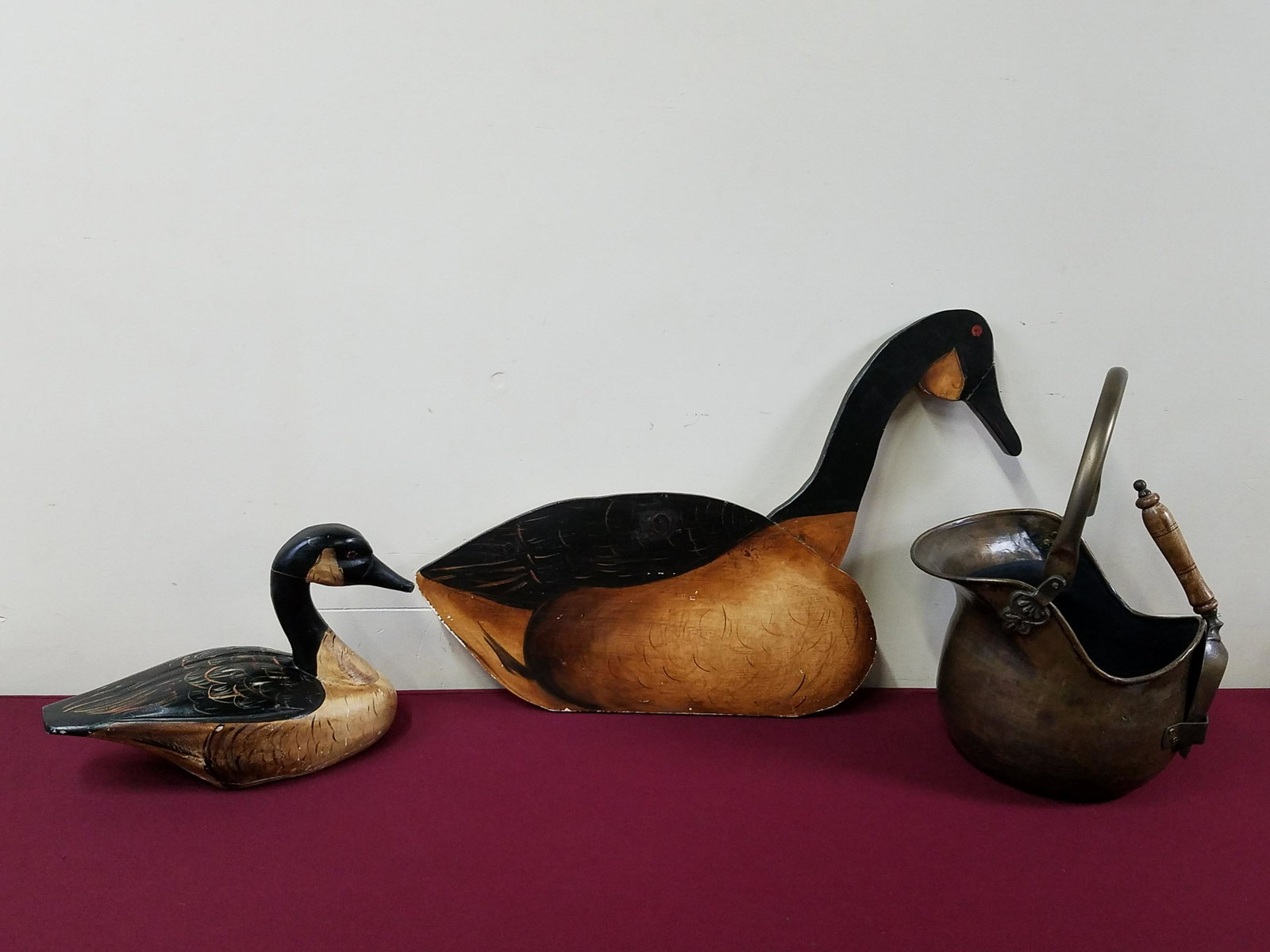 Decoy, Coal Bucket and Goose Wall Hanging: Decoy made in Canada. 9-3/4" to 19-1/2" high. IMPORTANT: Before bidding, please read the terms and conditions below. When you registered for the auction you agreed to these terms and will be required 