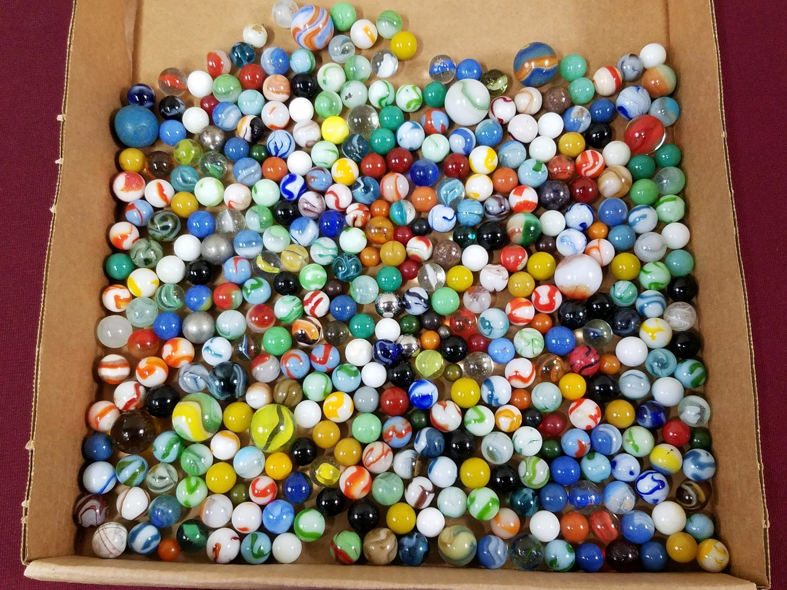 383 Marbles: Various sizes and conditions. IMPORTANT: Before bidding, please read the terms and conditions below. When you registered for the auction you agreed to these terms and will be required to comply with t