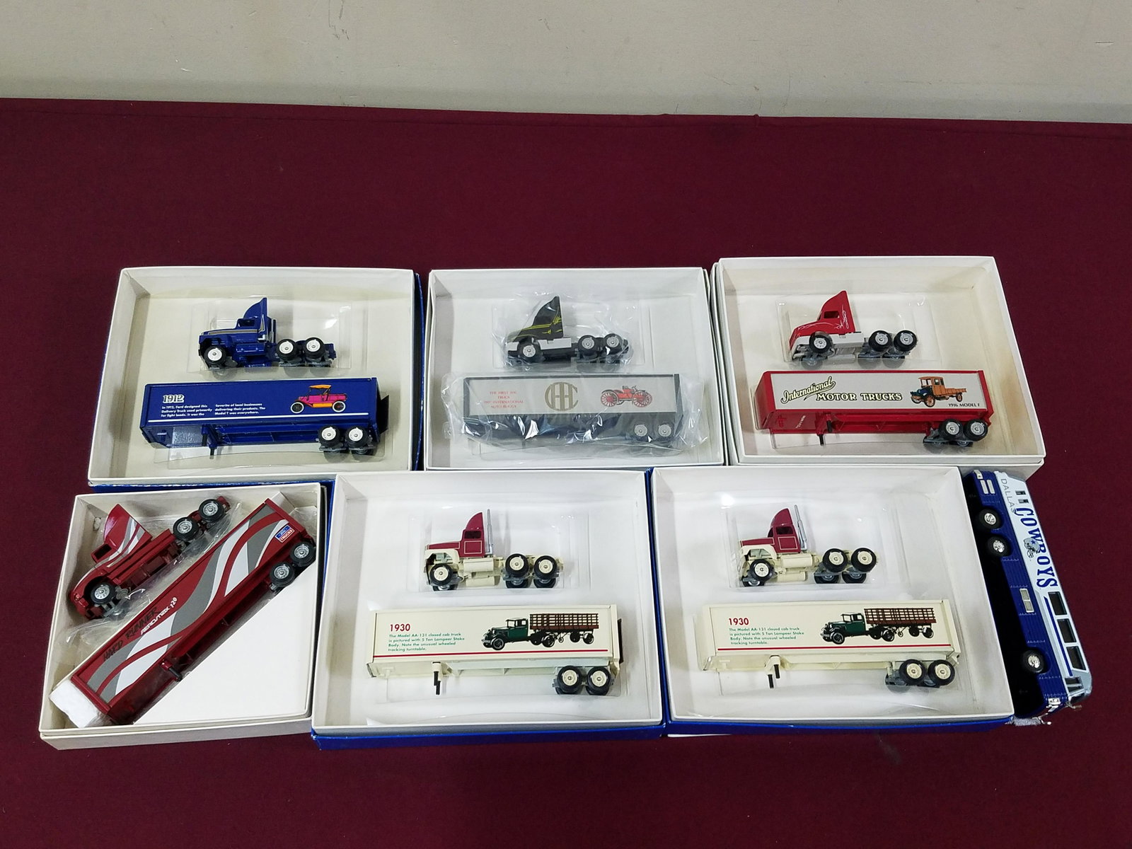 6 Winross Trucks incl Ford and Cowboys Bus: All with original boxes. IMPORTANT: Before bidding, please read the terms and conditions below. When you registered for the auction you agreed to these terms and will be required to comply with them.