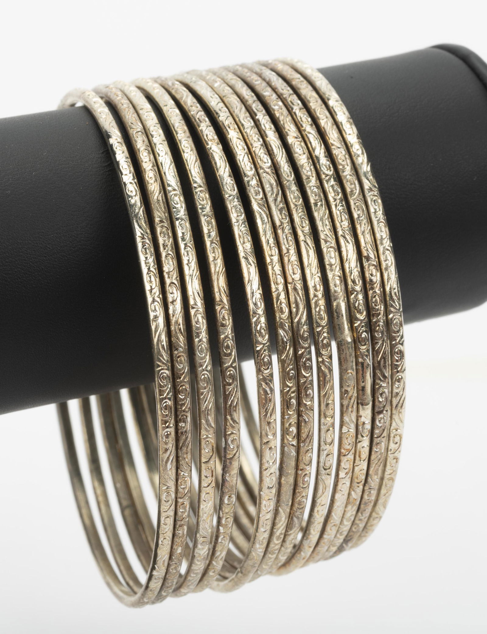 12 Silver Bangle Bracelets (1 of 2)