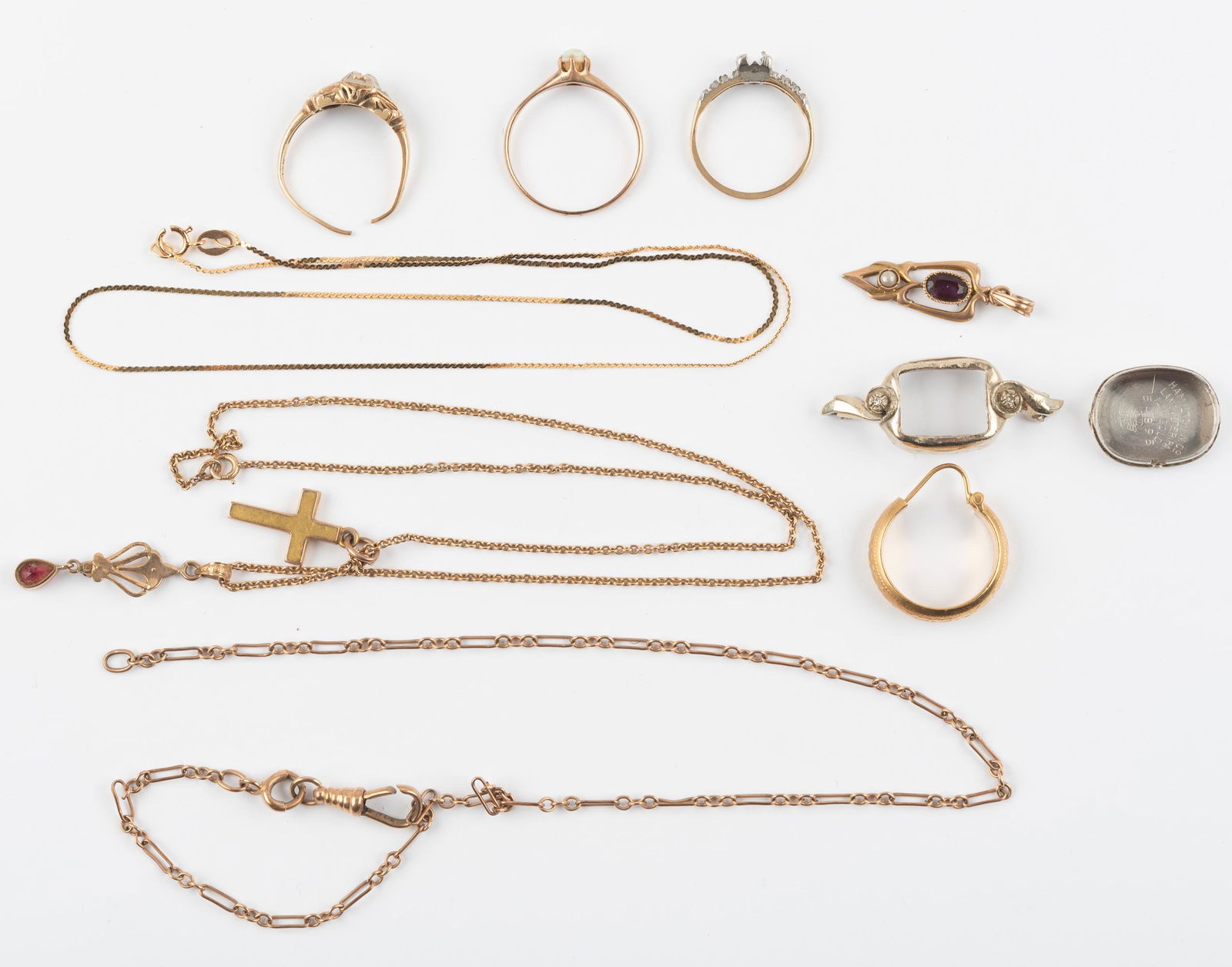 Mixed Scrap Gold with 10K, 14K, and 18K: Includes 18, 14, and 10K. 11.6 dwt. IMPORTANT: Before bidding, please read the terms and conditions below. When you registered for the auction you agreed to these terms and will be required to comply