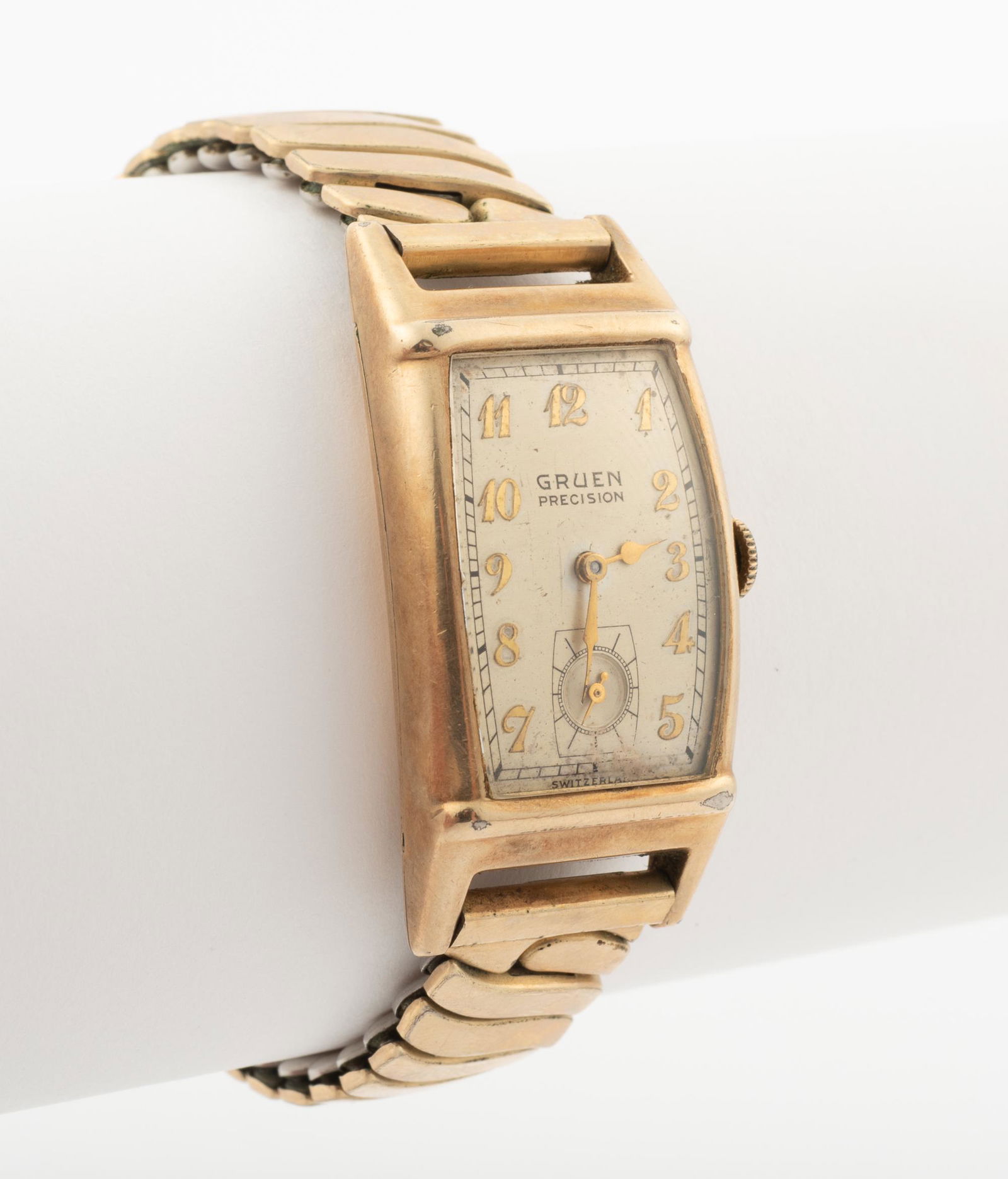 Gruen Precision Curvex Wrist Watch: 10k gold filled case.1-2/3" lug to lug. Running. IMPORTANT: Before bidding, please read the terms and conditions below. When you registered for the auction you agreed to these terms and will be requir