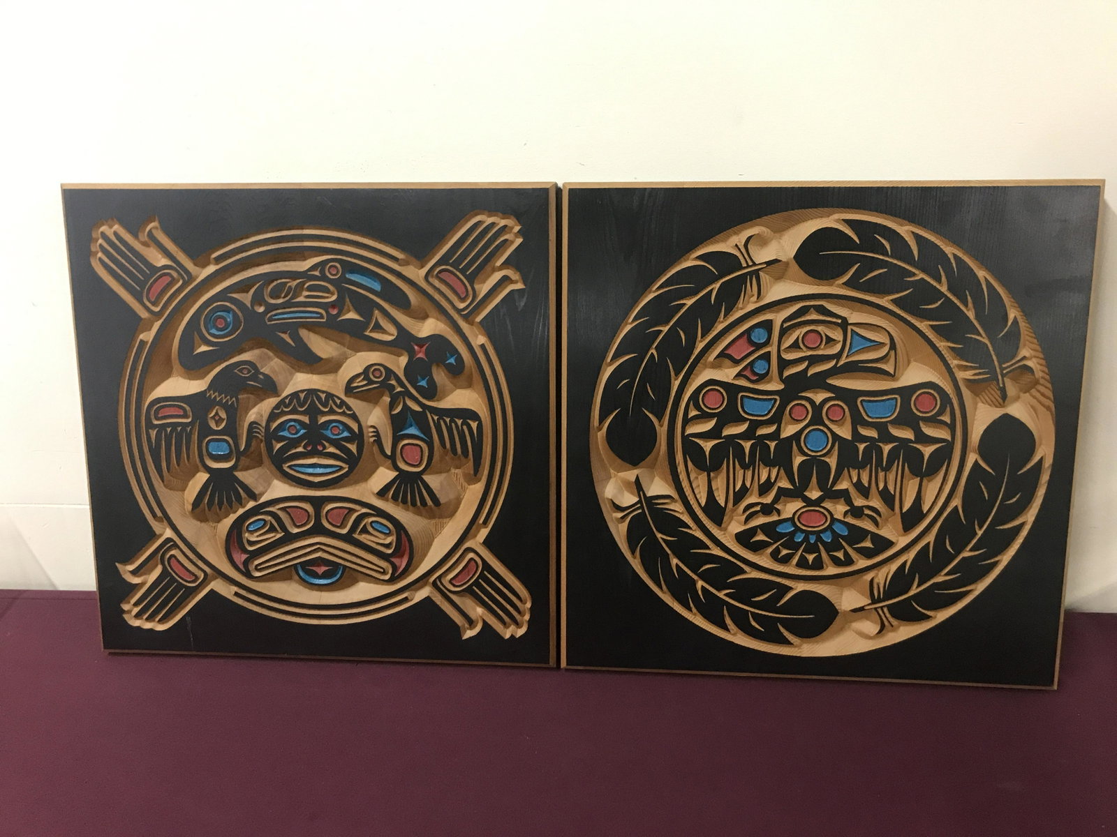 2 Neal W. Schlee Carved Panels: Produced at Lasertech in Anchorage, Alaska. Thunderbird design and totem design. Each signed. Each 19" x 19". IMPORTANT: Before bidding, please read the terms and conditions below. When you registered