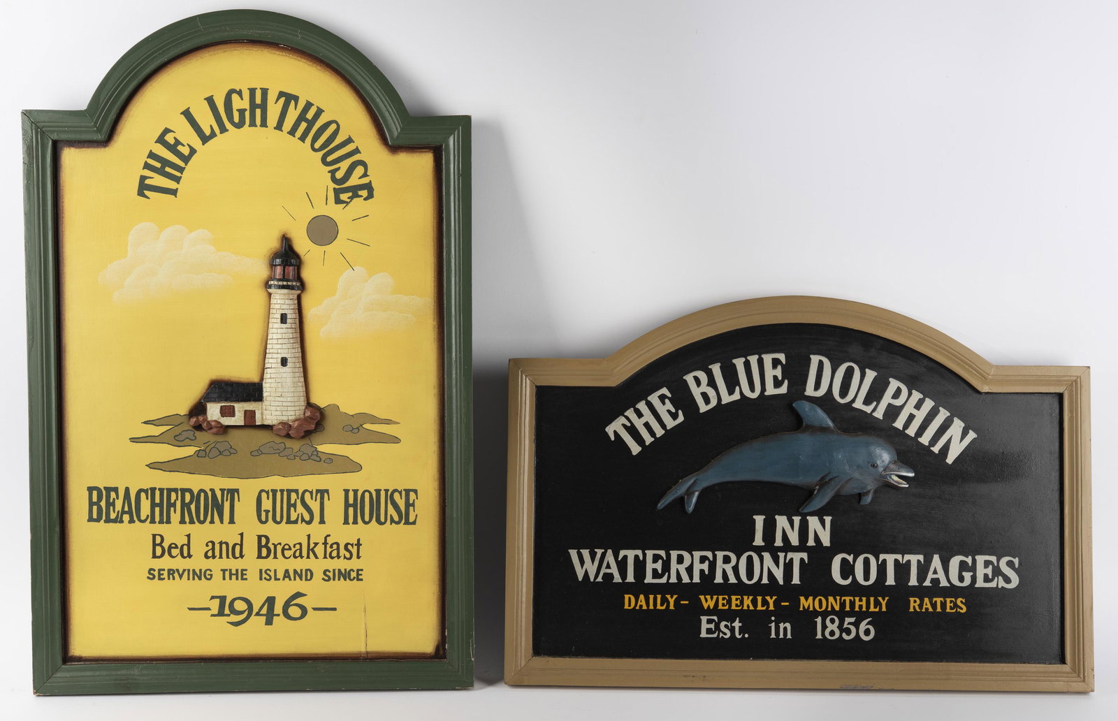 2 Repro Wooden Waterfront Inn Signs: Includes The Blue Dolphin Inn Waterfront Cottages and The Lighthouse Beachfront Guest House Bed and Breakfast. 16" x 23-1/2" and 26-7/8" x 17-3/8". IMPORTANT: Before bidding, please read the terms and