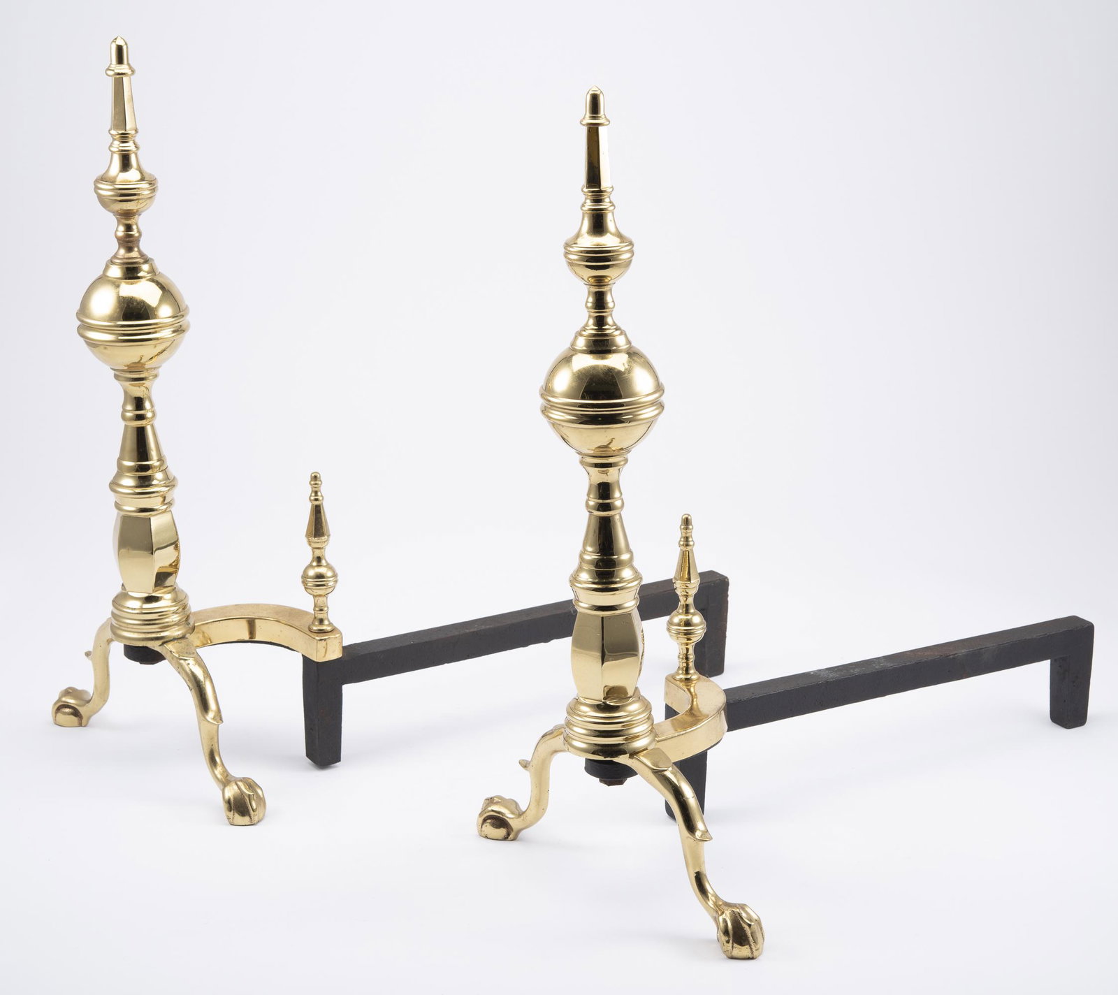 Pair of Brass Andirons: 11-1/2" wide x 21" deep x 22" high. IMPORTANT: Before bidding, please read the terms and conditions below. When you registered for the auction you agreed to these terms and will be required to comply 