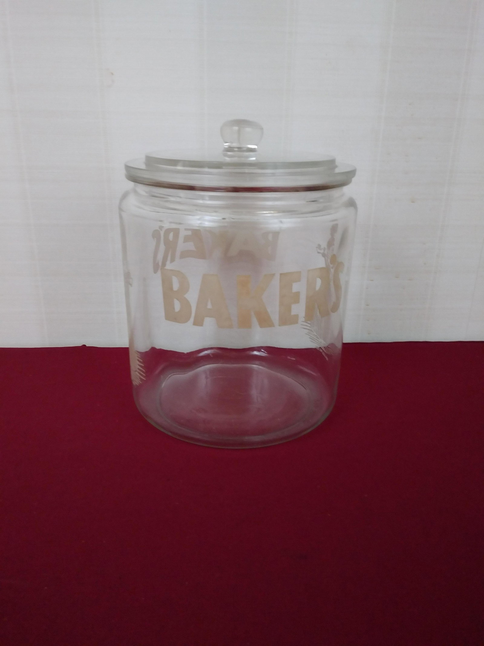 Baker's Glass Canister: 7" diameter x 9" high. IMPORTANT: Before bidding, please read the terms and conditions below. When you registered for the auction you agreed to these terms and will be required to comply with them.