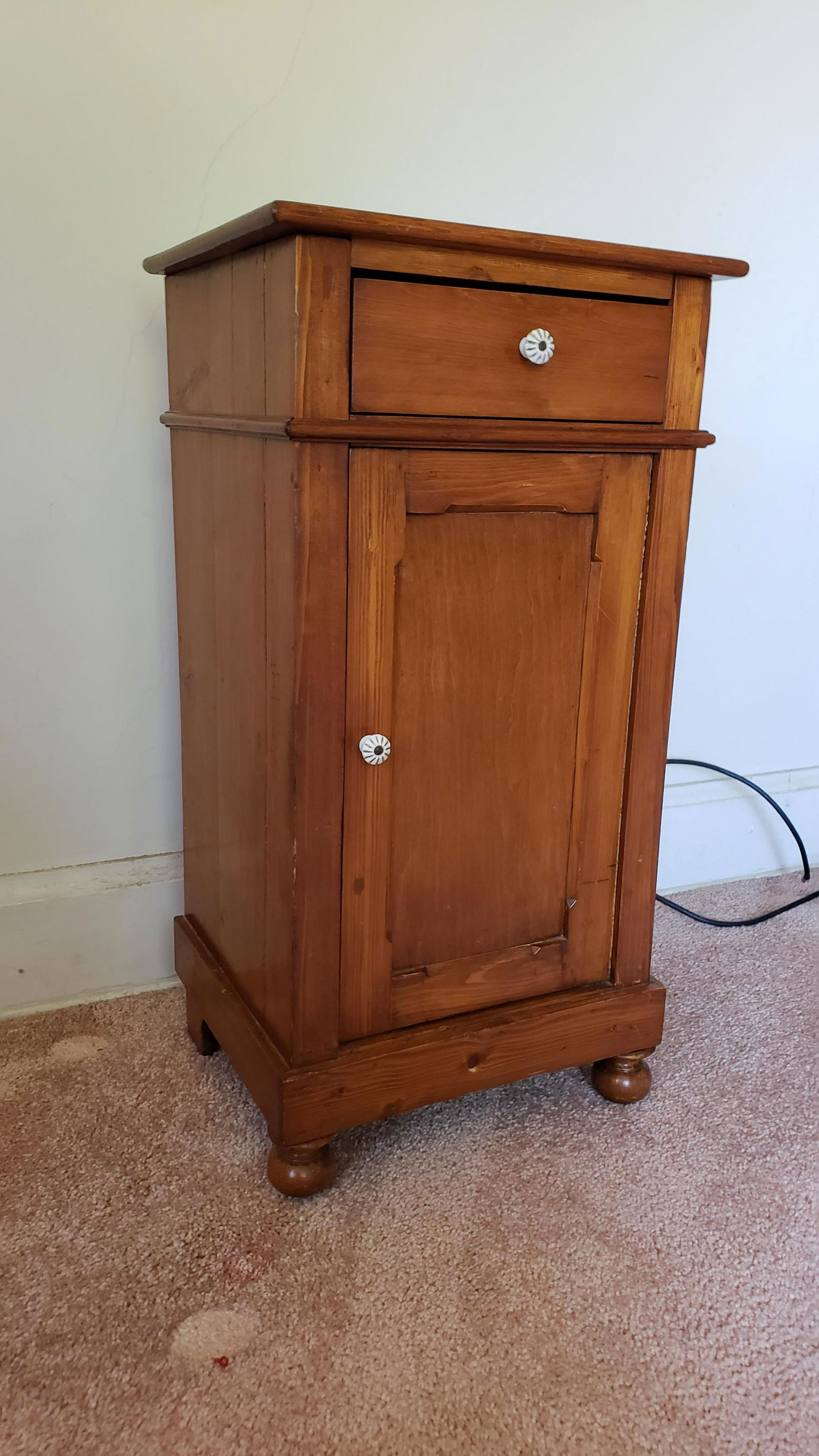Commode: Single drawer over single door. 15-3/4" wide x 14-1/4" deep x 29-3/4" high. IMPORTANT: Before bidding, please read the terms and conditions below. When you registered for the auction you agreed to the