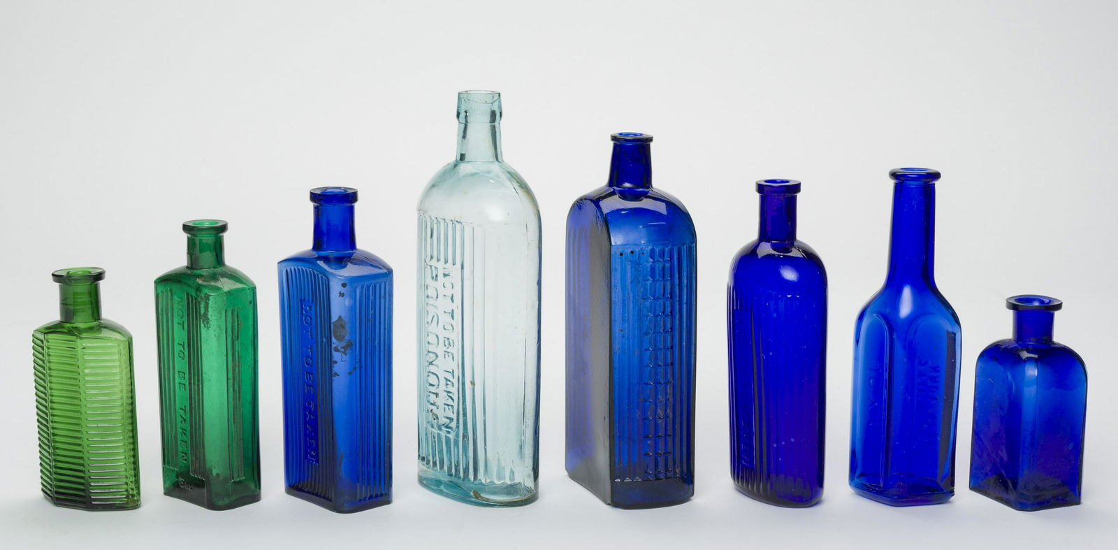8 Antique Poison Bottles (1 of 1)