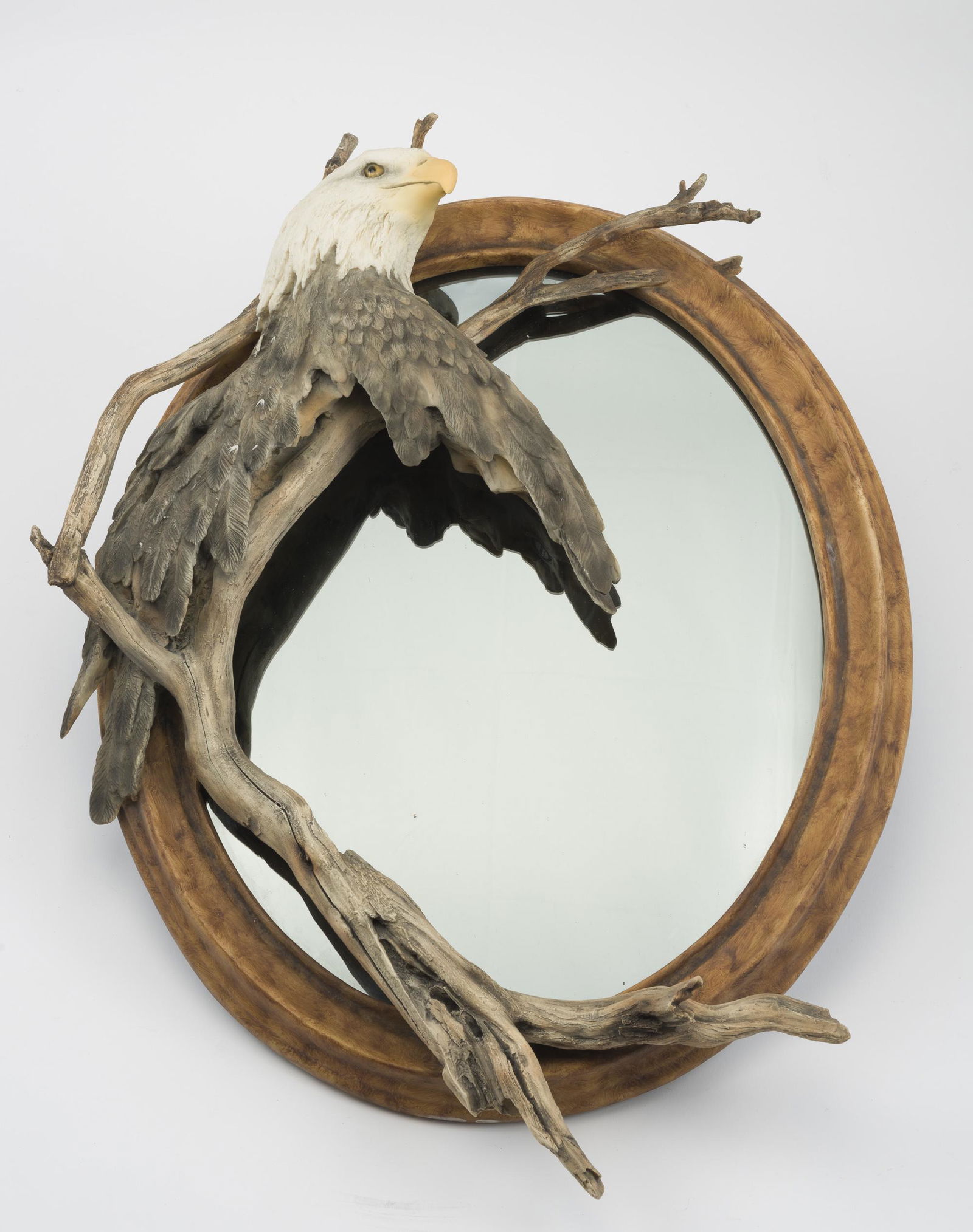 Eagle Head Decorated Wall Mirror: 26" x 20". Made of resin material. IMPORTANT: Before bidding, please read the terms and conditions below. When you registered for the auction you agreed to these terms and will be required to comply w