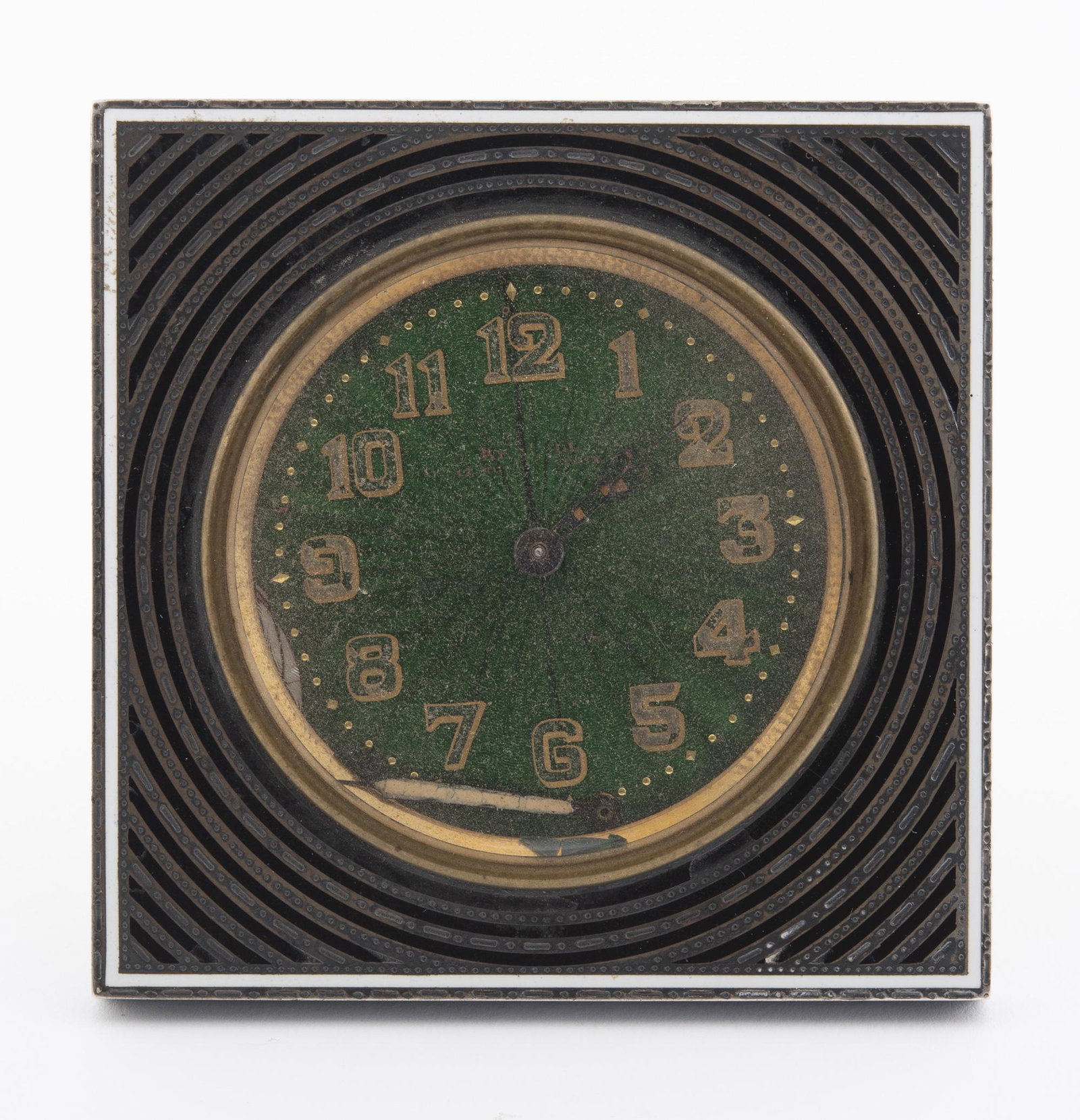 French Sterling & Enamel Desk Clock: Case is black and white enamel. Dial is green enamel with some losses. 3" wide. Starts and stops. Hands. IMPORTANT: Before bidding, please read the terms and conditions below. When you registered for 
