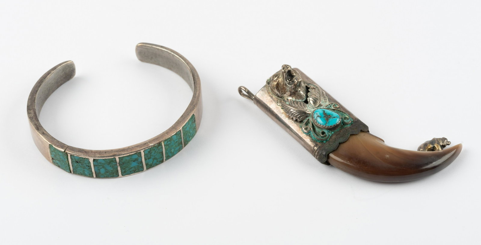 Native American Silver Cuff and Bear Claw Pendant: Cuff 4/10" at widest point with 2" interior width. Navajo pendant 2-1/2" long set with turquoise and genuine bear claw. IMPORTANT: Before bidding, please read the terms and conditions below. When you 