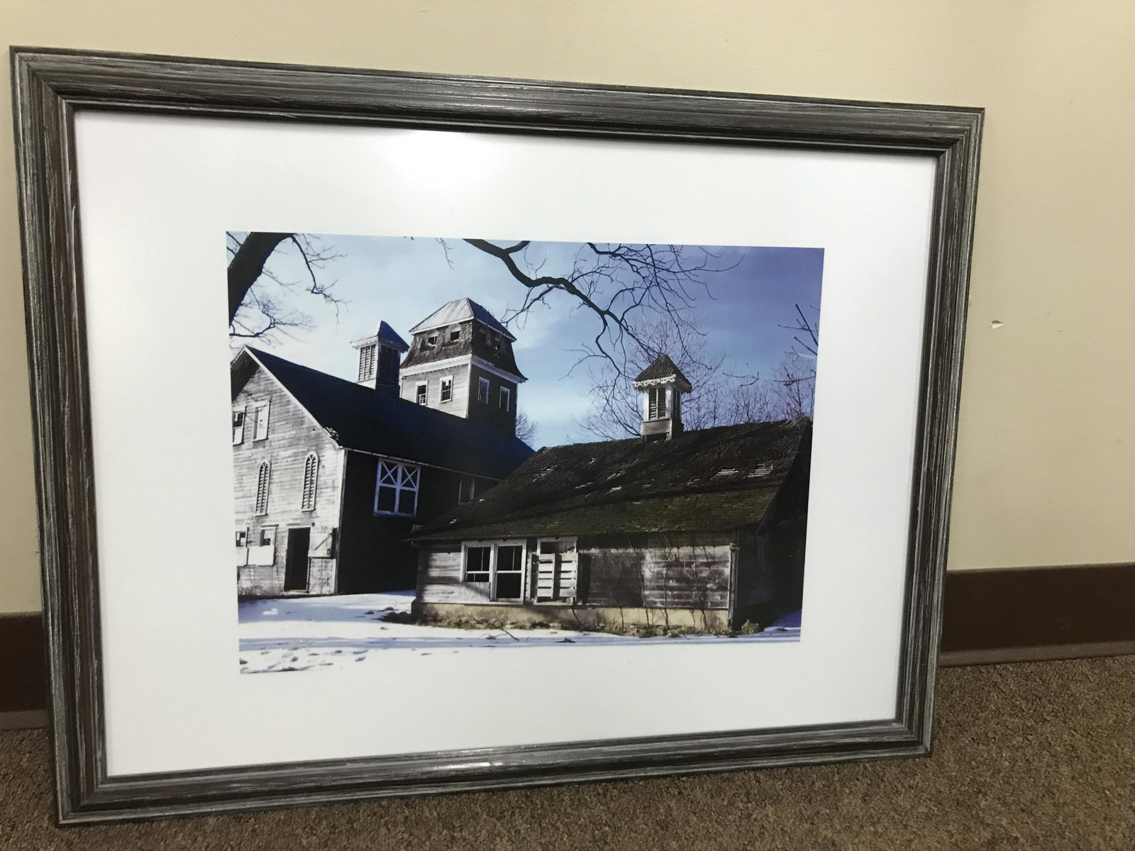 Ruth Sullivan (American, 1939-2011): Photograph of Adams County, Pennsylvania barn in snow. This barn, located on Guernsey Road in Biglerville, is #99 on the Adams County Barn Registry. Overall with frame 20-1/2" high x 26-1/2" wide. IMP