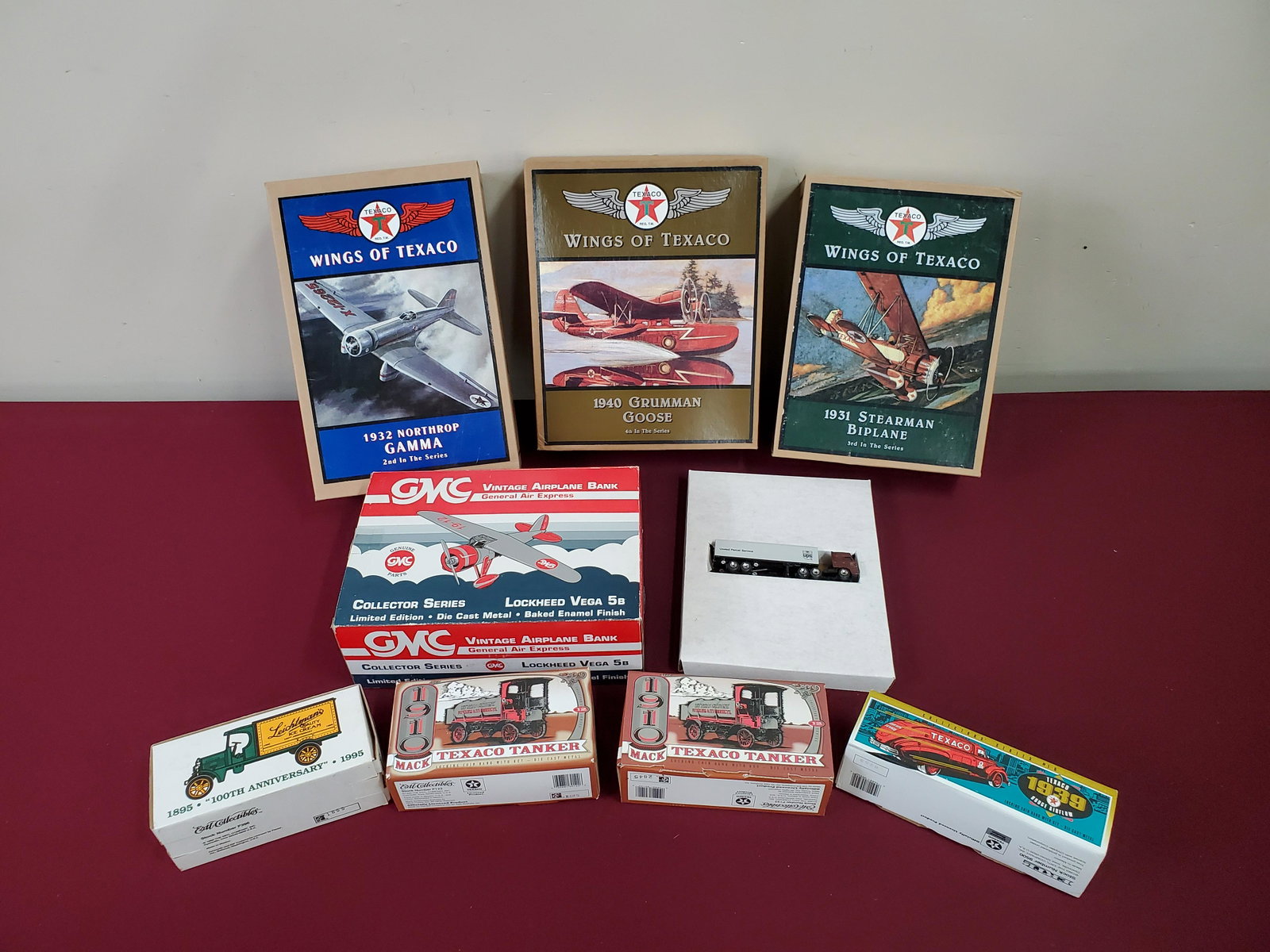 9 Die Cast Banks and Planes: All in original box. IMPORTANT: Before bidding, please read the terms and conditions below. When you registered for the auction you agreed to these terms and will be required to comply with them.