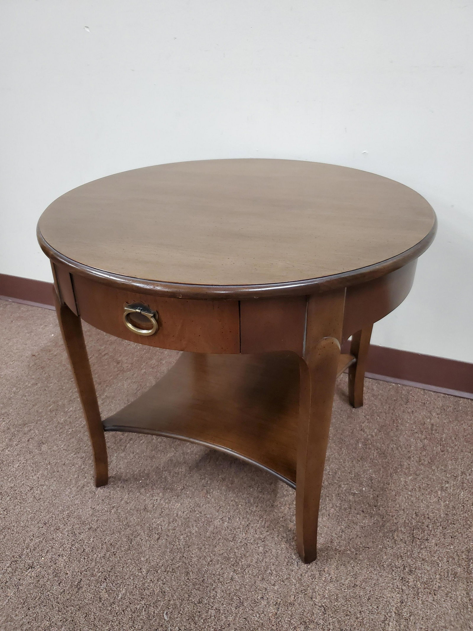 Round End Table: 26" wide X 22" high. IMPORTANT: Before bidding, please read the terms and conditions below. When you registered for the auction you agreed to these terms and will be required to comply with them.