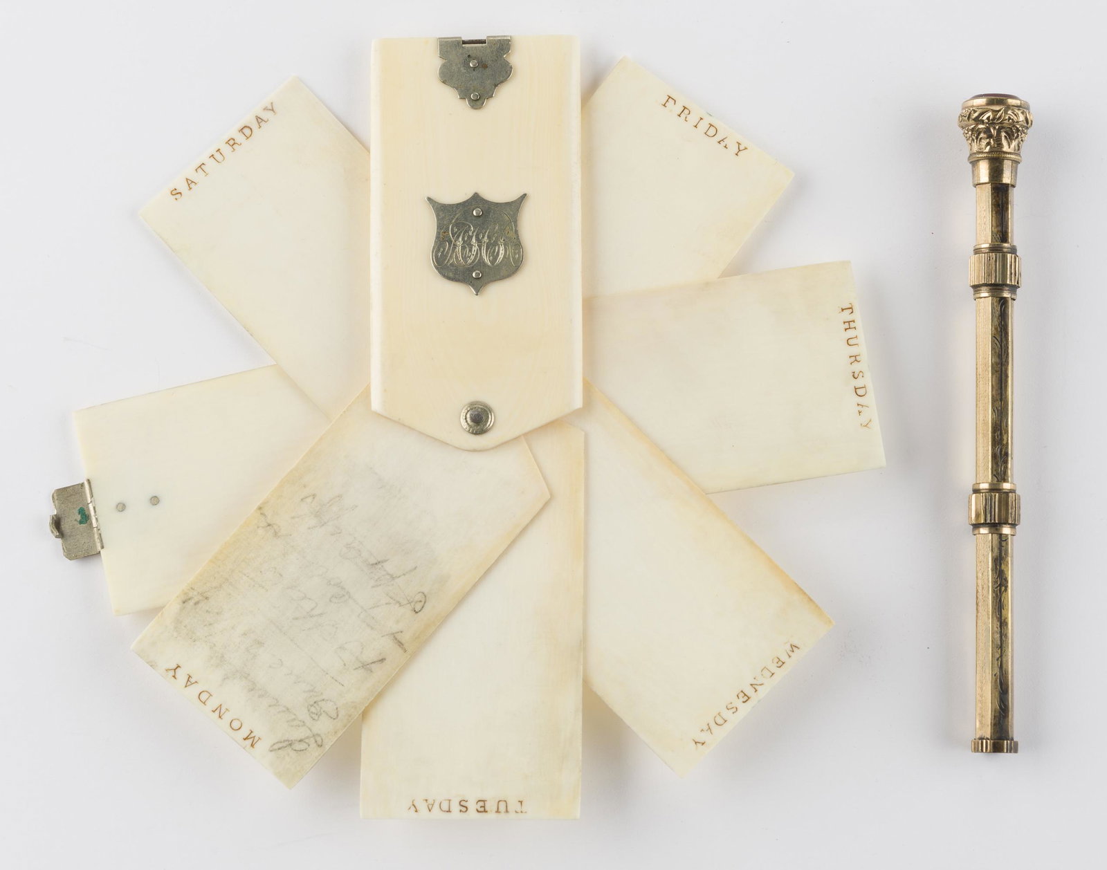 1891 Chatelaine Calendar with Victorian Pen/Pencil: Weekly calendar. Monogrammed. 2-3/4" x 1-3/8". Pen/pencil 4-1/4" long. IMPORTANT: Before bidding, please read the terms and conditions below. When you registered for the auction you agreed to these te