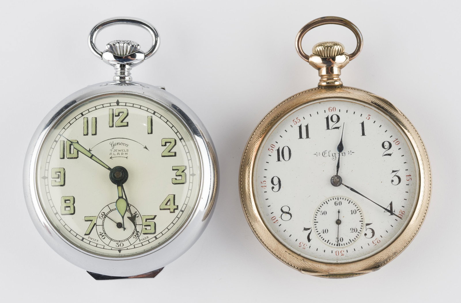 2 Pocketwatches: Includes: 1) Genova. 7 jewels. With alarm. Marked "Cesar Renfert-Abrecht Swiss". 2-5/8". 2) Elgin. 17 jewels. Adjusted. Serial Number 9081988. Monogrammed. Working. 2-3/4". IMPORTANT: Before bidding, 