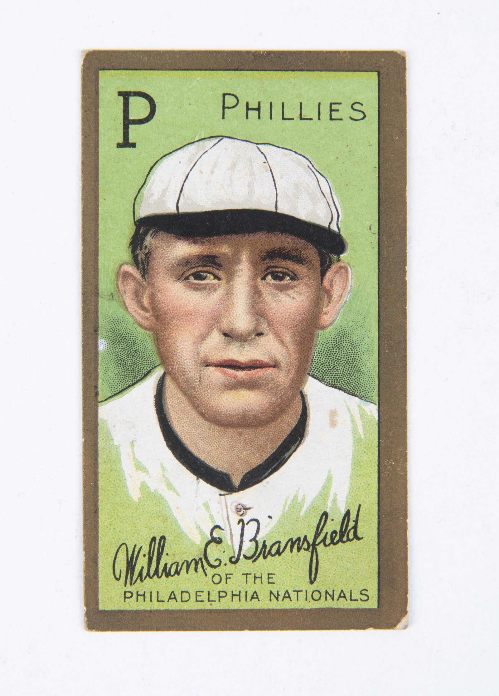 T205 1911 Gold Border Wm. E. Bransfield: Polar Bear back. VG-EX IMPORTANT: Before bidding, please read the terms and conditions below. When you registered for the auction you agreed to these terms and will be required to comply with them.