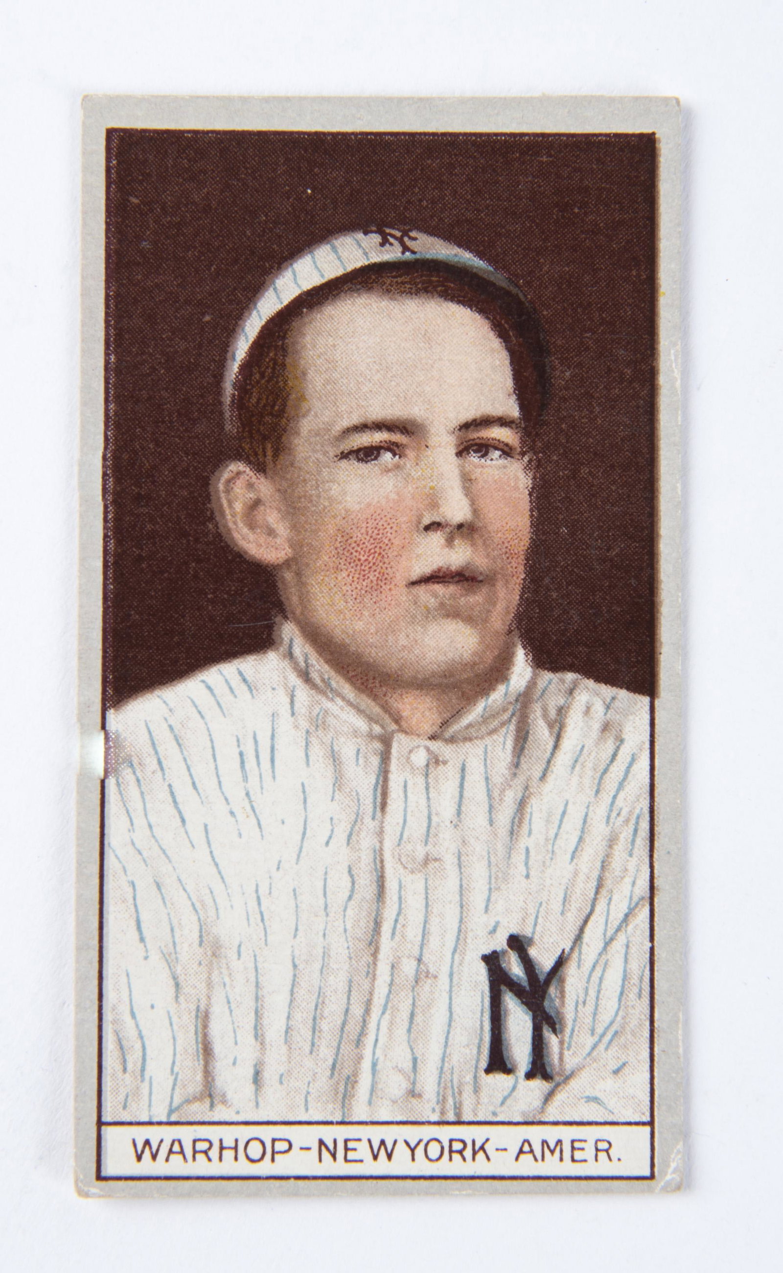 T207 1912 Brown Background John Warhop: VG IMPORTANT: Before bidding, please read the terms and conditions below. When you registered for the auction you agreed to these terms and will be required to comply with them.