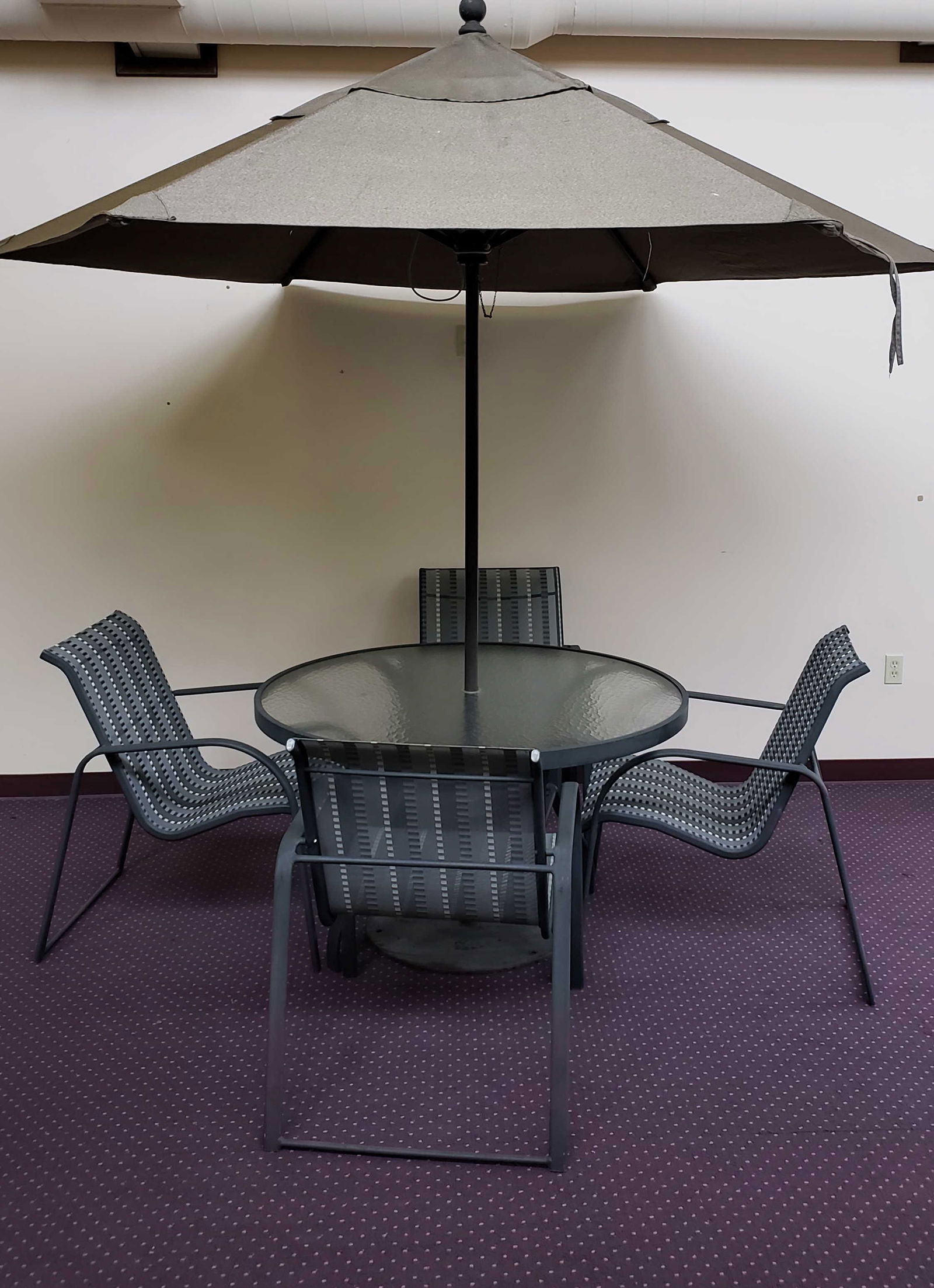Metal and Glass Table with 4 Chairs and Umbrella: Table: 48-1/2" diameter x 27-1/4" high. Chairs 25-1/4" wide x 31" deep x 34" high. Umbrella: 102" high. IMPORTANT: Before bidding, please read the terms and conditions below. When you registered for t