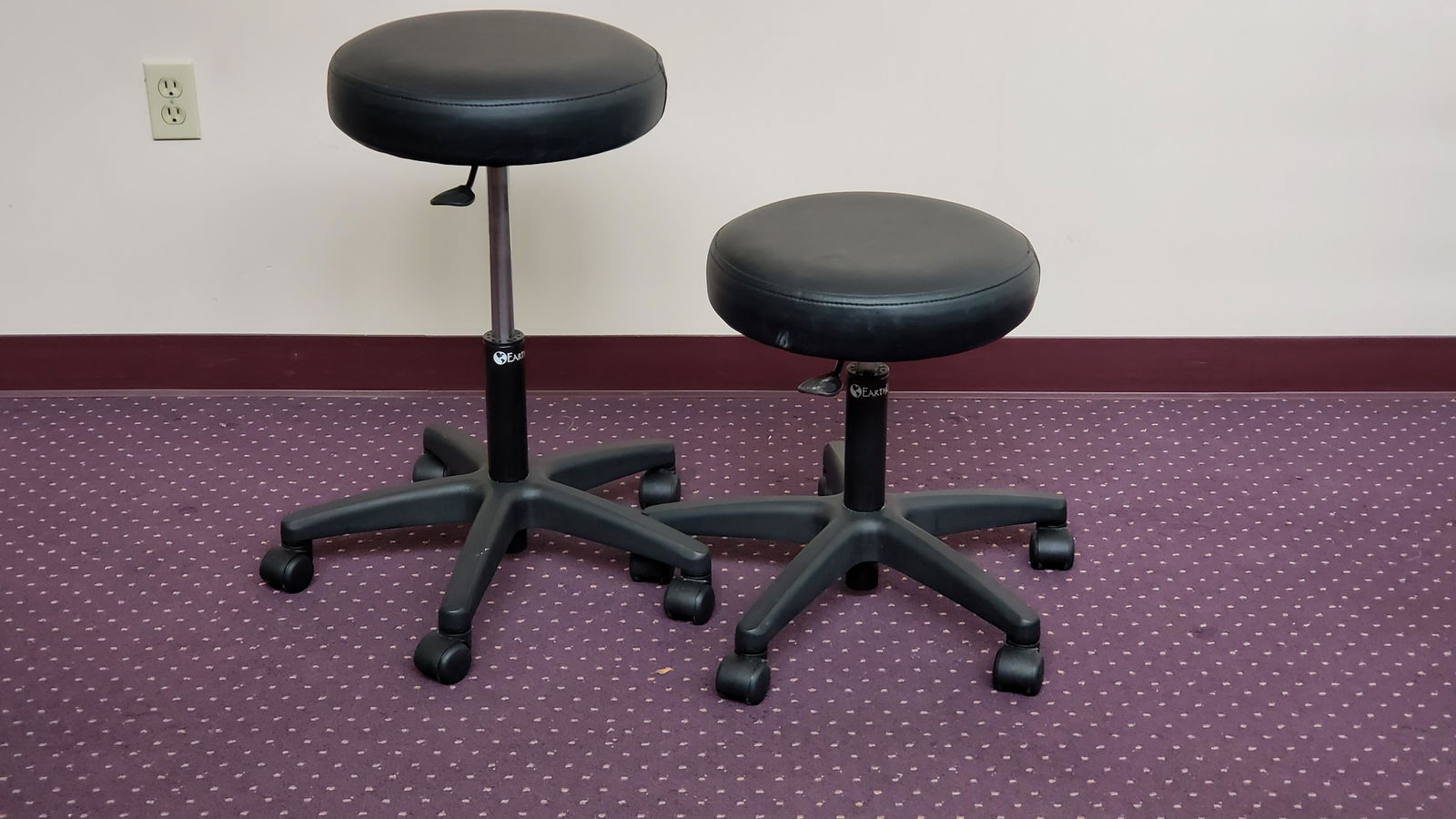 Pair of EarthLite Rolling Stools (1 of 2)