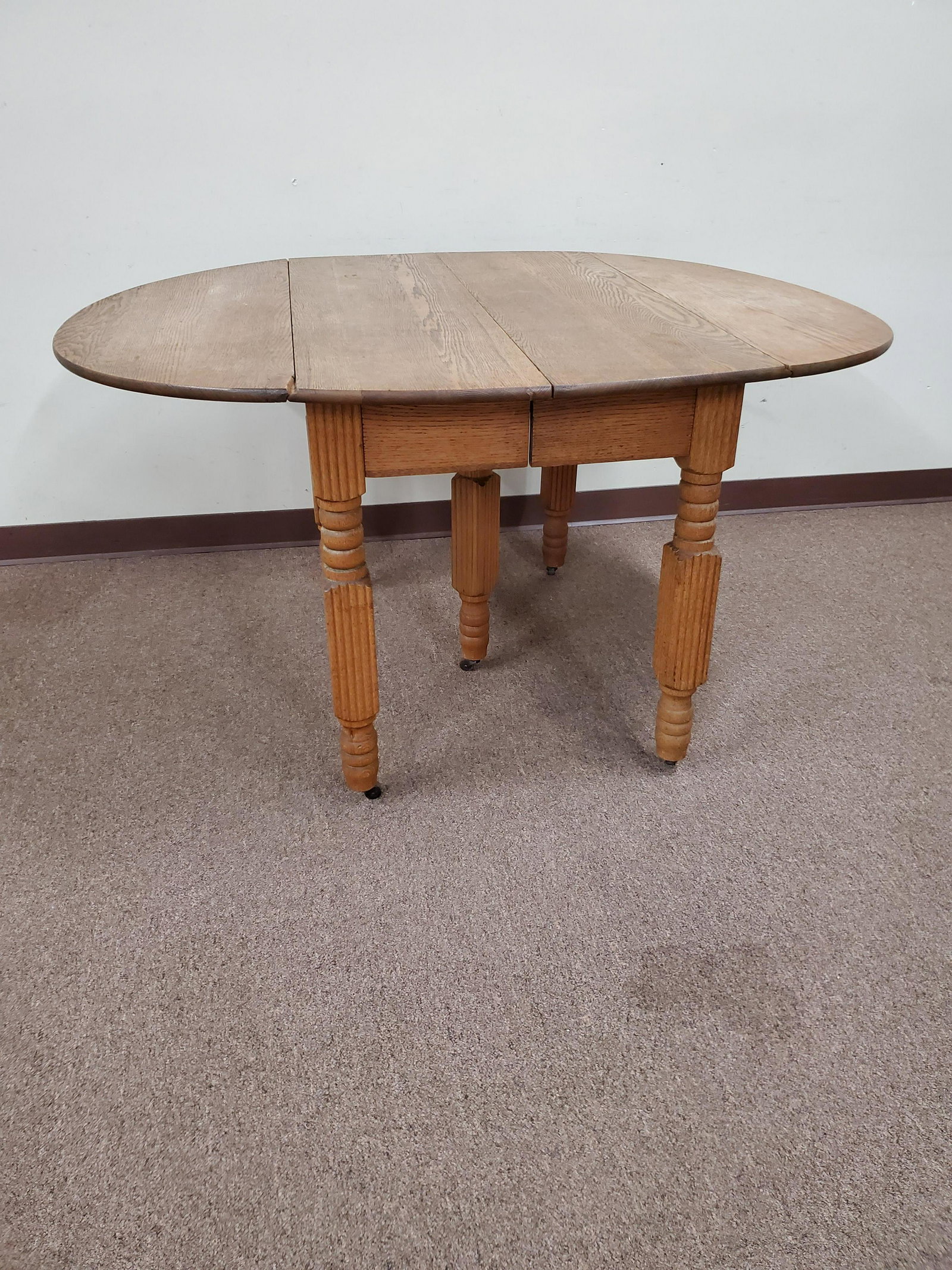Round Drop Side Table: Open 54" closed 27" wide X 42" deep X 29" high. IMPORTANT: Before bidding, please read the terms and conditions below. When you registered for the auction you agreed to these terms and will be require