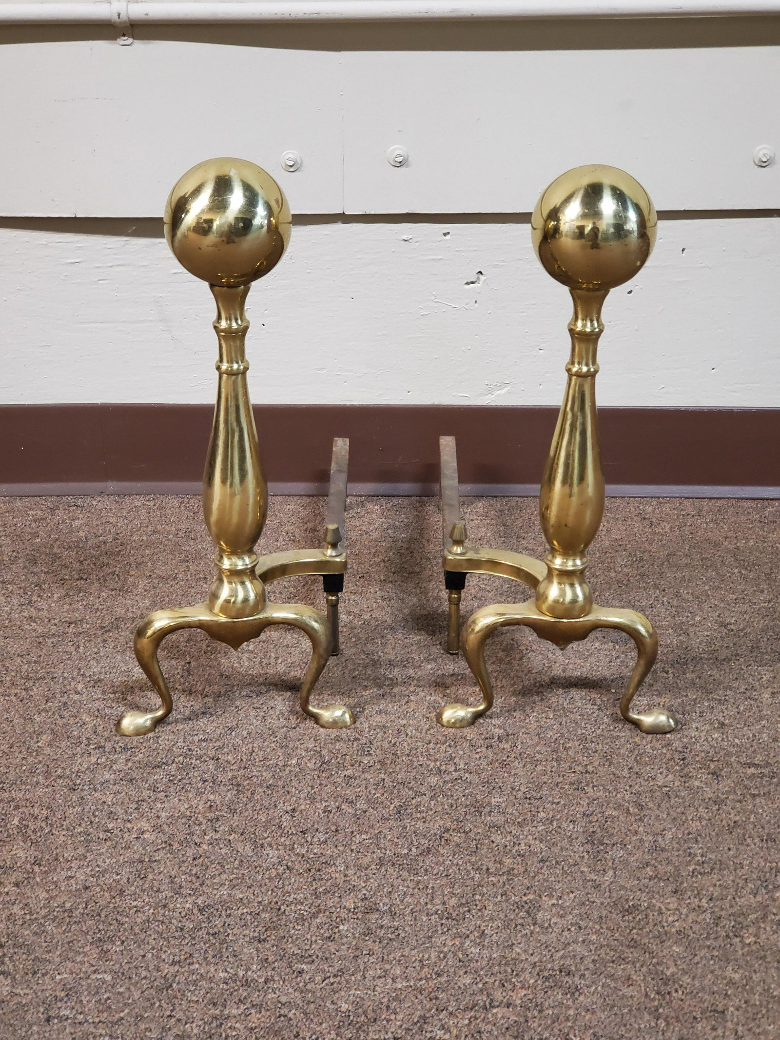 Brass Andirons: 8" wide X 17" deep X 18" high. IMPORTANT: Before bidding, please read the terms and conditions below. When you registered for the auction you agreed to these terms and will be required to comply with 