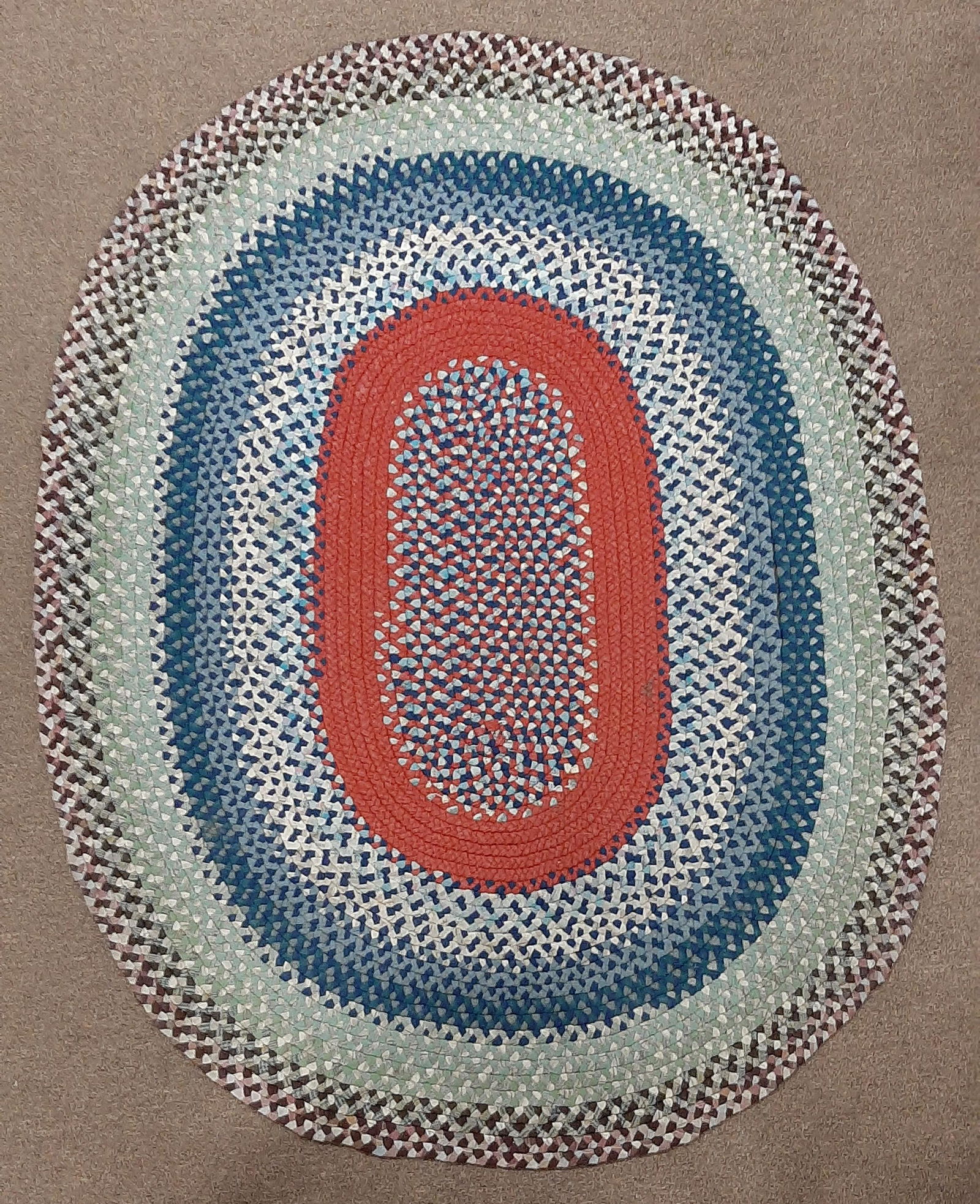 Braided Rug: 6' 5" X 5'. IMPORTANT: Before bidding, please read the terms and conditions below. When you registered for the auction you agreed to these terms and will be required to comply with them.