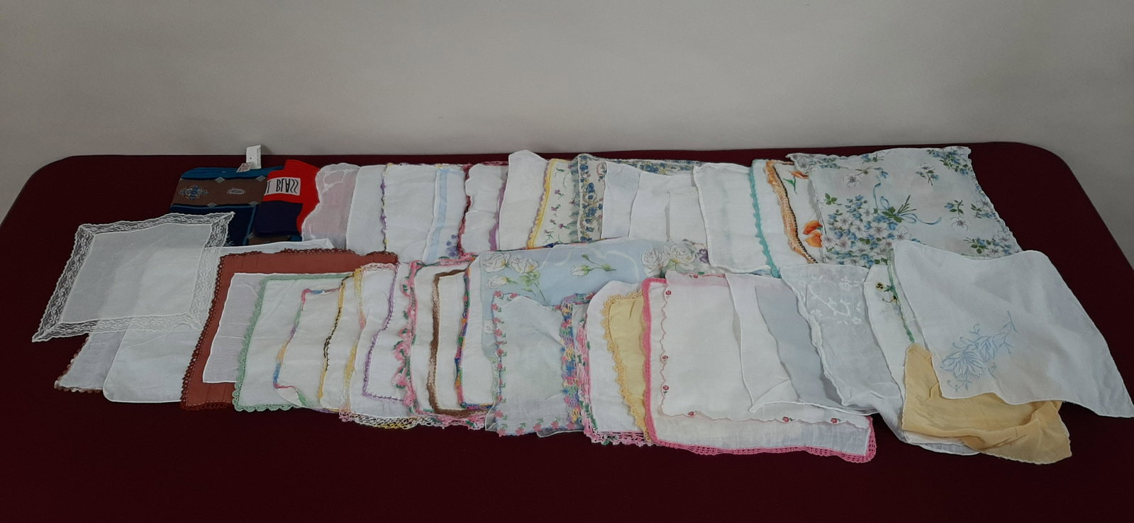 Approx. 100 Scarves and Handkerchiefs: 11" to 34" square. IMPORTANT: Before bidding, please read the terms and conditions below. When you registered for the auction you agreed to these terms and will be required to comply with them.