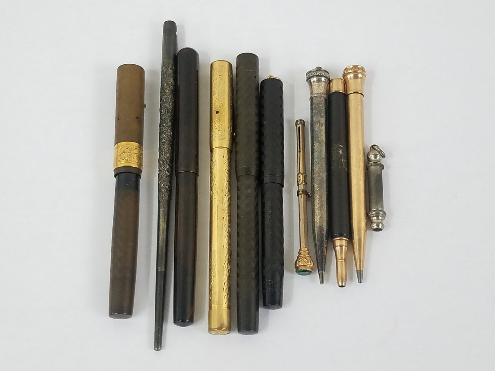 11 Pens and Pencils included Sterling: Also includes Eversharp and Waterman. Sterling pen: .43 ozt. IMPORTANT: Before bidding, please read the terms and conditions below. When you registered for the auction you agreed to these terms and wi