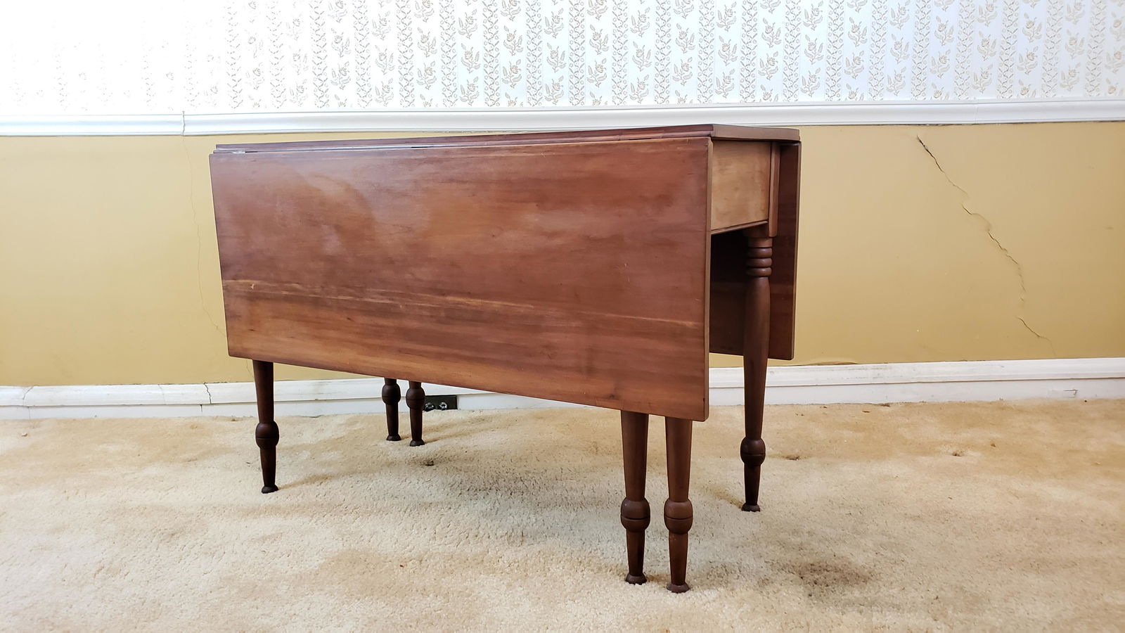 Drop Leaf Table: 51-1/4" wide x 42" deep x 29-1/2" high when open; 19-1/4" wide when closed. IMPORTANT: Before bidding, please read the terms and conditions below. When you registered for the auction you agreed to the