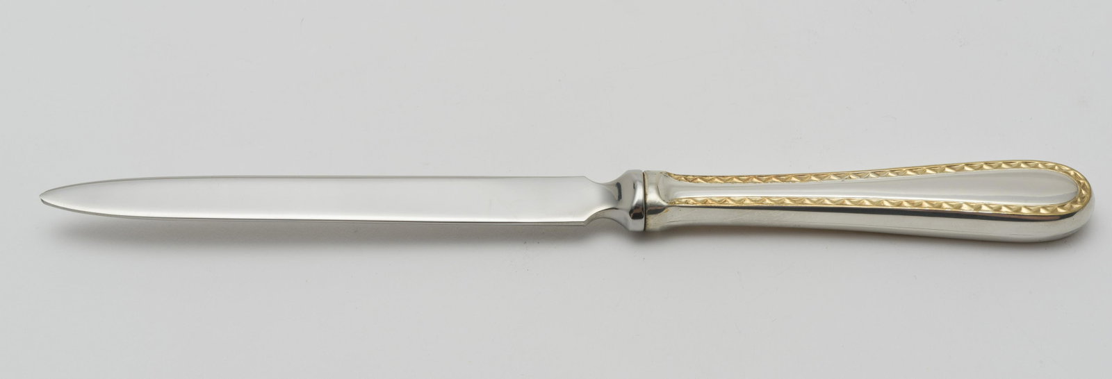 Kirk Steiff Sterling Handled Letter Opener: Golden Winslow pattern. In original box, with original plastic. 8" long.