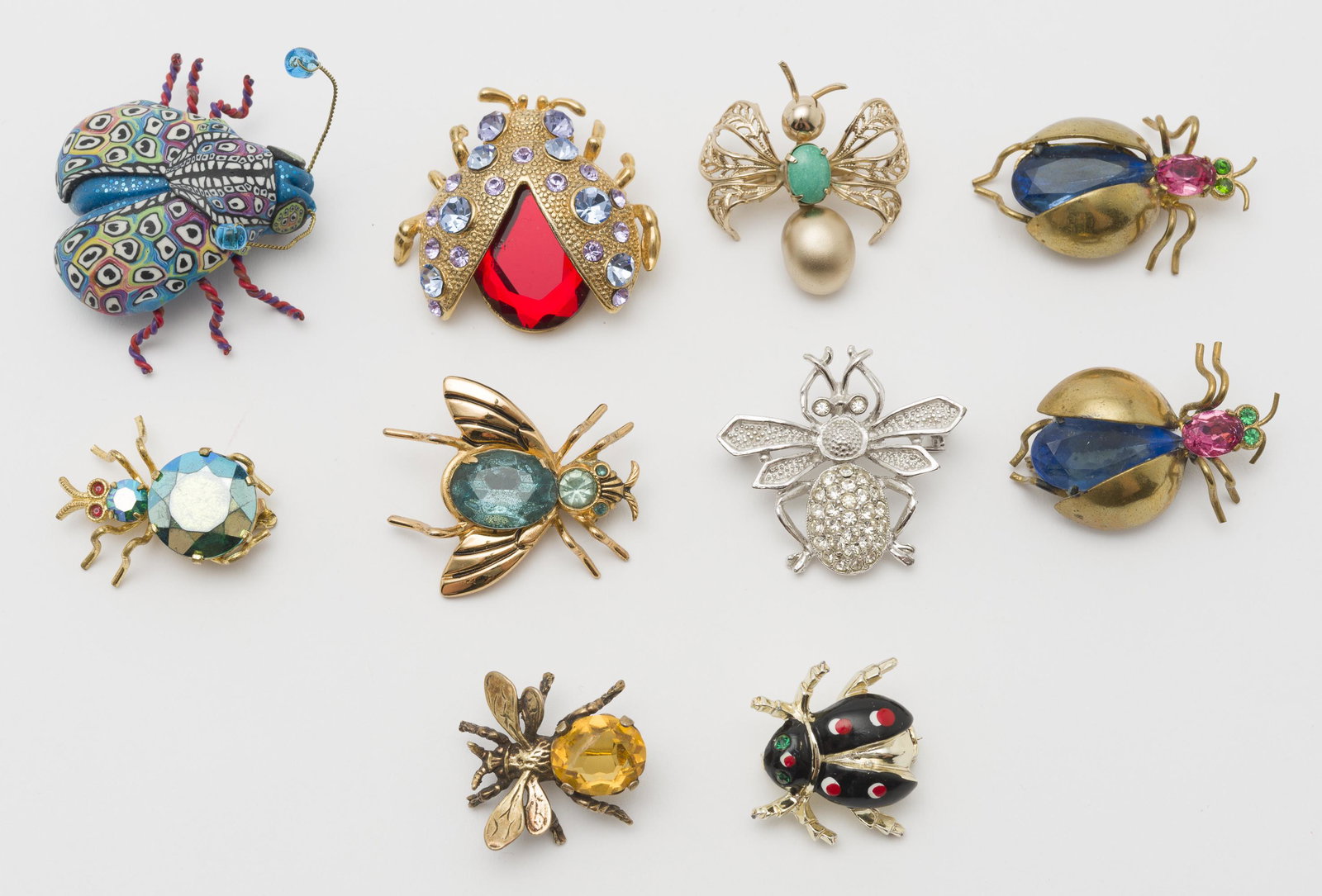 10 Insect Brooches Incl Coro and Czech Glass: Bee with yellow stone 3/4" wide x 3/4" high; clay brooch incl 1-1/4" wide x 1-1/2" high.