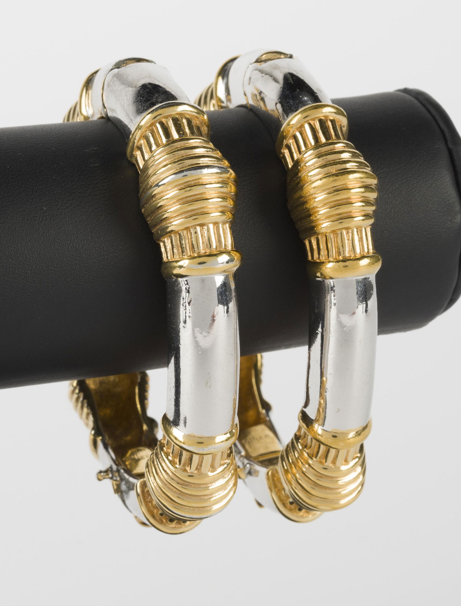 Pair of Ciner Fashion Bangles: Hinged. Interior 2-2/3" wide. 1/2" wide.