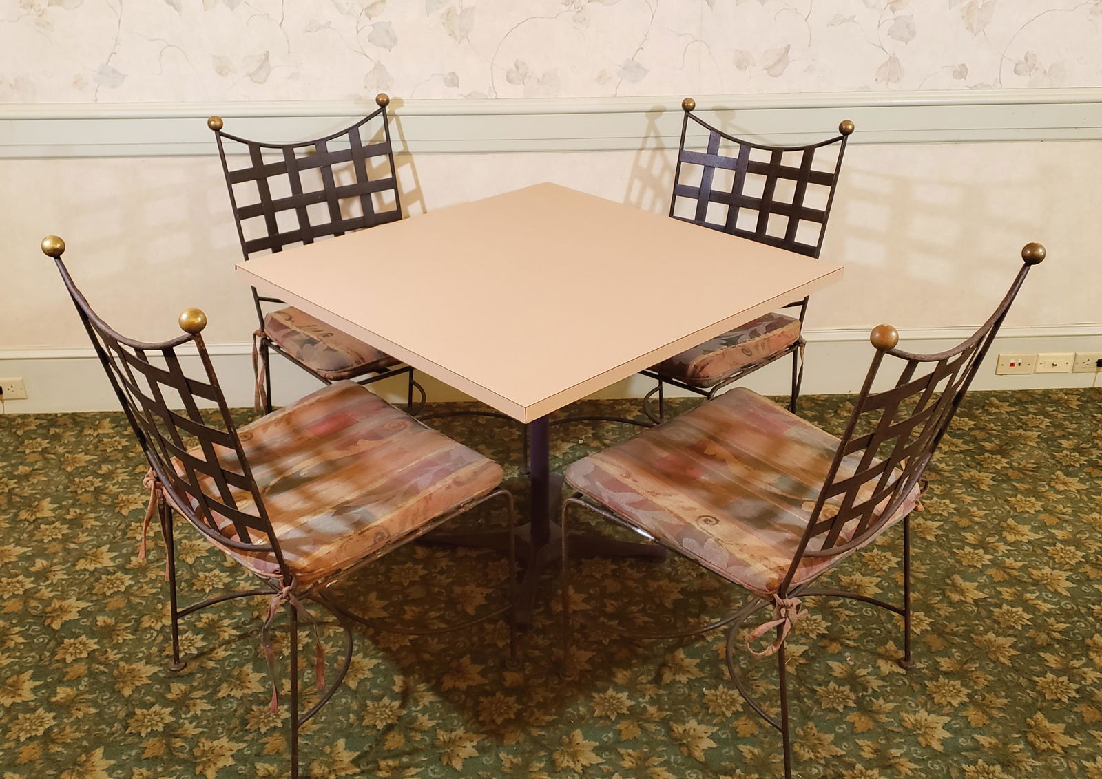 Table and 4 Chairs: Formica top table: 36" square x 29" high. Four wrought metal side chairs with cushion each: 19" wide x 19" deep x 37" high. Wear to Formica at corners. IMPORTANT: Before bidding, please read the terms
