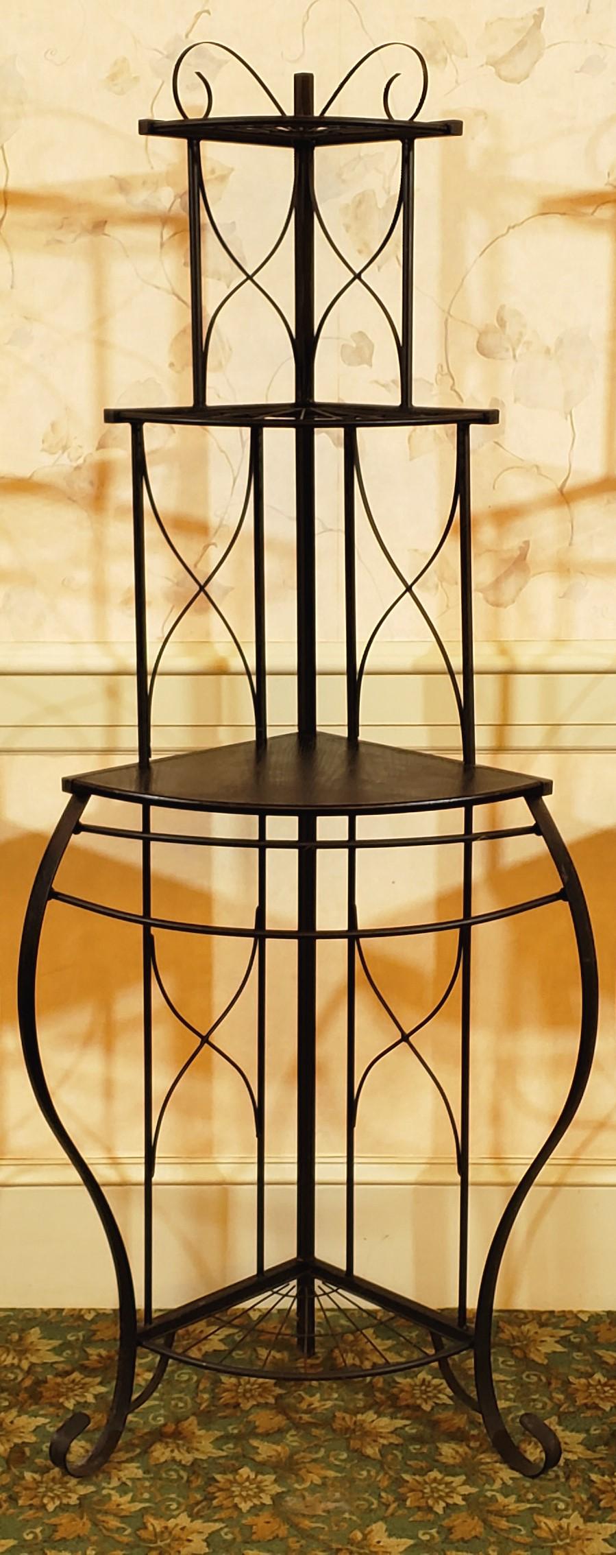 Corner Shelf: Metal and wood. 25" long x 18" deep x 64" high. IMPORTANT: Before bidding, please read the terms and conditions below. When you registered for the auction you agreed to these terms and will be require