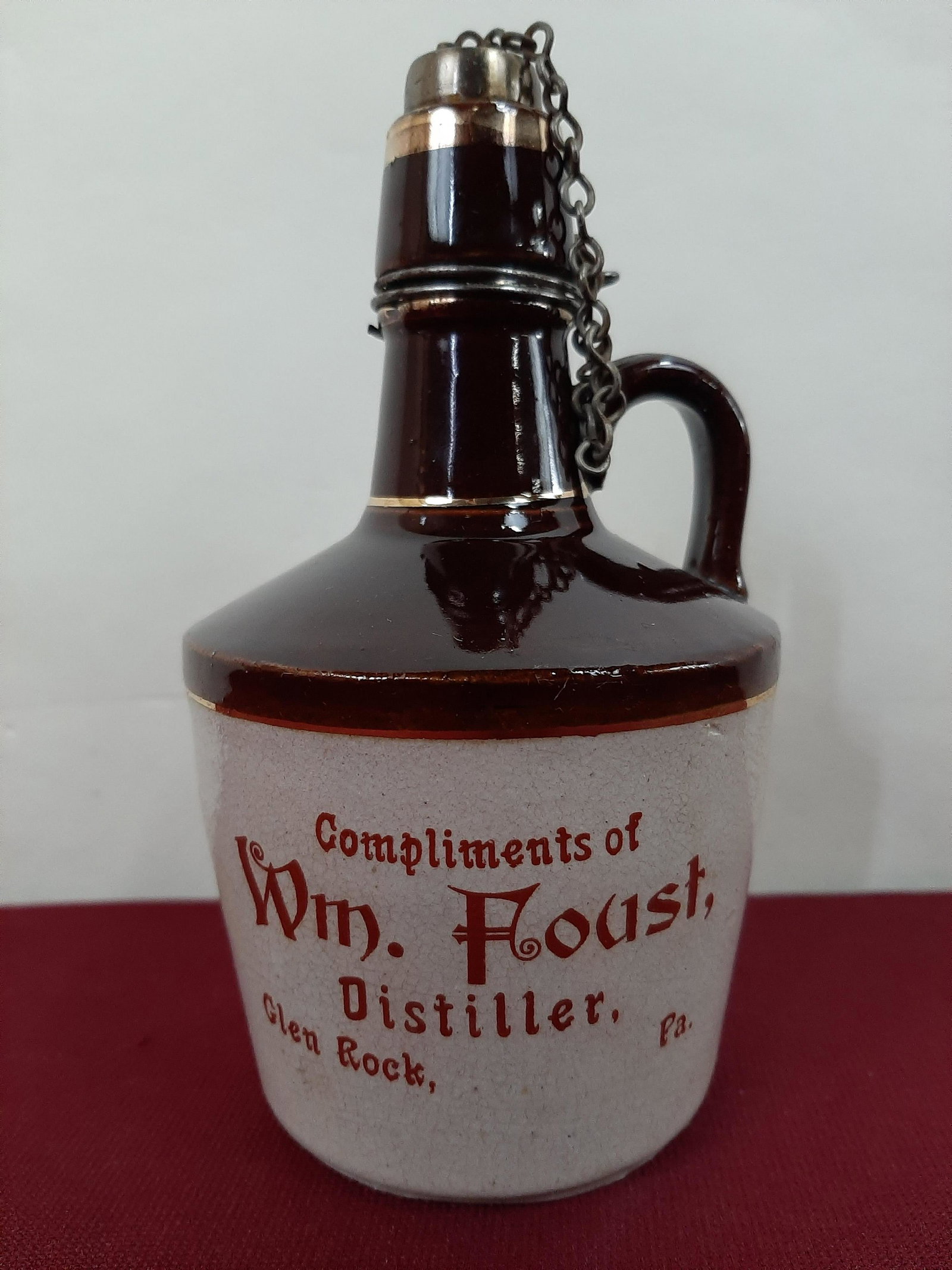 5 3/4" William Foust Distiller Advertising Bottle: 3 1/4" diameter X 5 3/4" high. IMPORTANT: Before bidding, please read the terms and conditions below. When you registered for the auction you agreed to these terms and will be required to comply with 