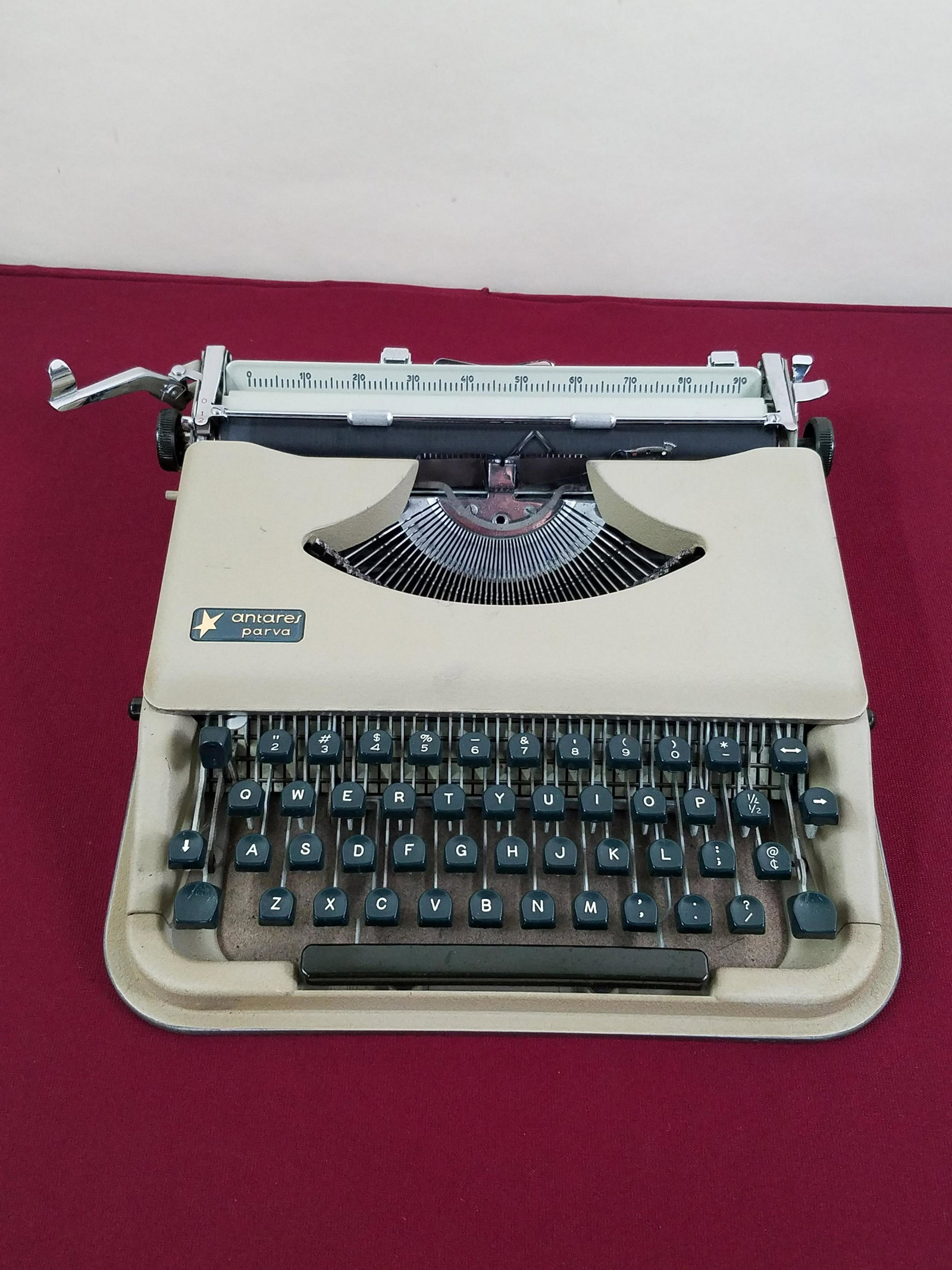 Antares Parva Typewriter: 12-1/2" wide x 13" deep x 3" high. IMPORTANT: Before bidding, please read the terms and conditions below. When you registered for the auction you agreed to these terms and will be required to comply w