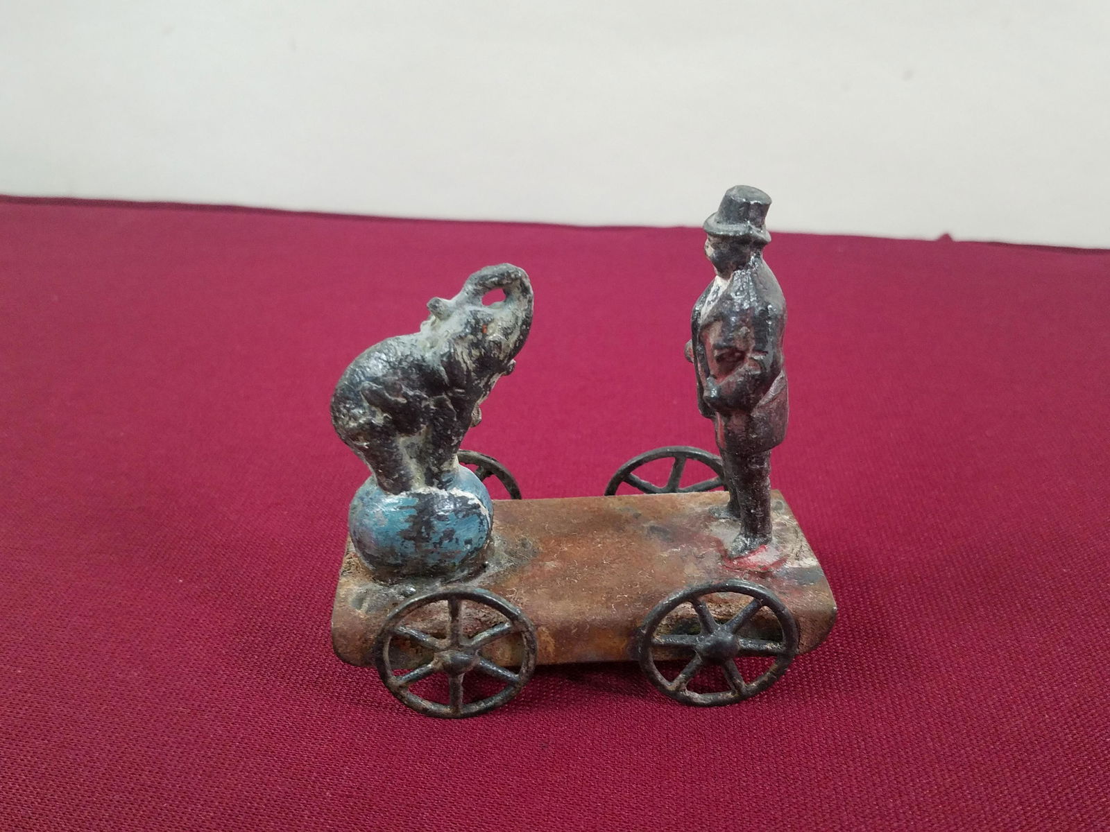 Circus Elephant Penny Toy: 3-1/4" long x 3-1/4" high. IMPORTANT: Before bidding, please read the terms and conditions below. When you registered for the auction you agreed to these terms and will be required to comply with them