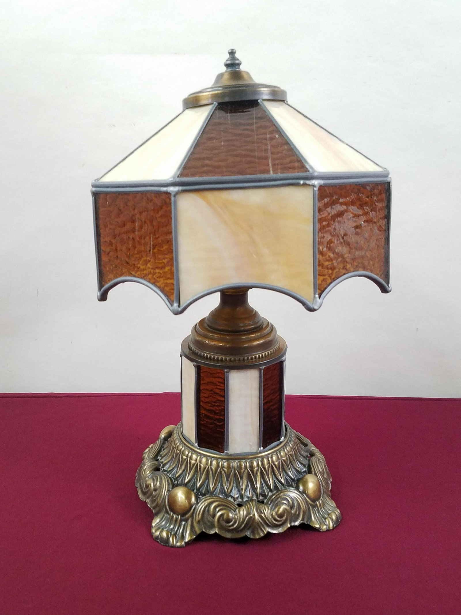 Slag and Amber Glass Lamp: Double light. Working. Shade: 10-1/2" wide x 16-1/4" high. One amber panel with loss. Knob missing fitting. IMPORTANT: Before bidding, please read the terms and conditions below. When you registered f