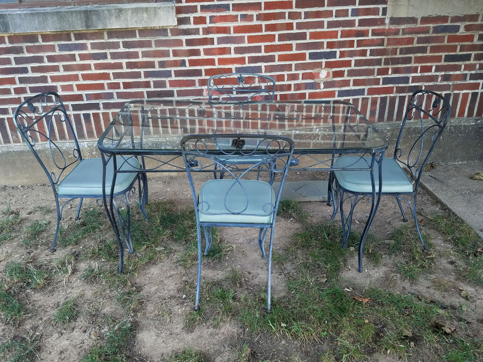 Outdoor Table and 4 Chairs: Table: 54" wide x 32" deep x 29" high. Scratches to glass. Chairs: 18-1/2" wide x 22" deep x 33-1/2" high. IMPORTANT: Before bidding, please read the terms and conditions below. When you registered fo