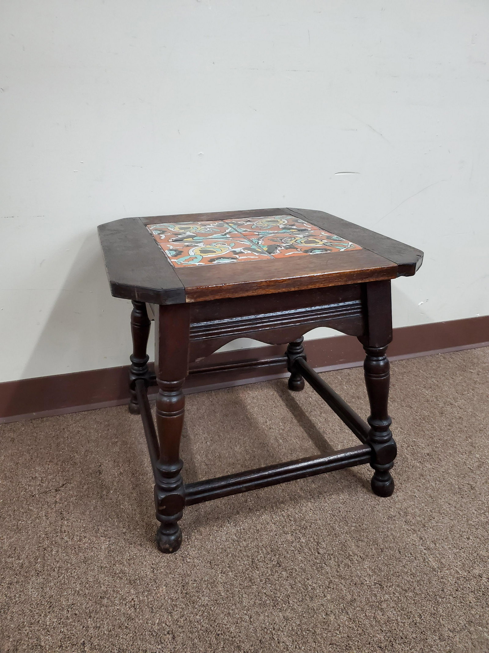 Tile Top Side Table: 19 1/2" wide X 19 1/2" deep X 18 1/4" high. One corner has a split. IMPORTANT: Before bidding, please read the terms and conditions below. When you registered for the auction you agreed to these terms