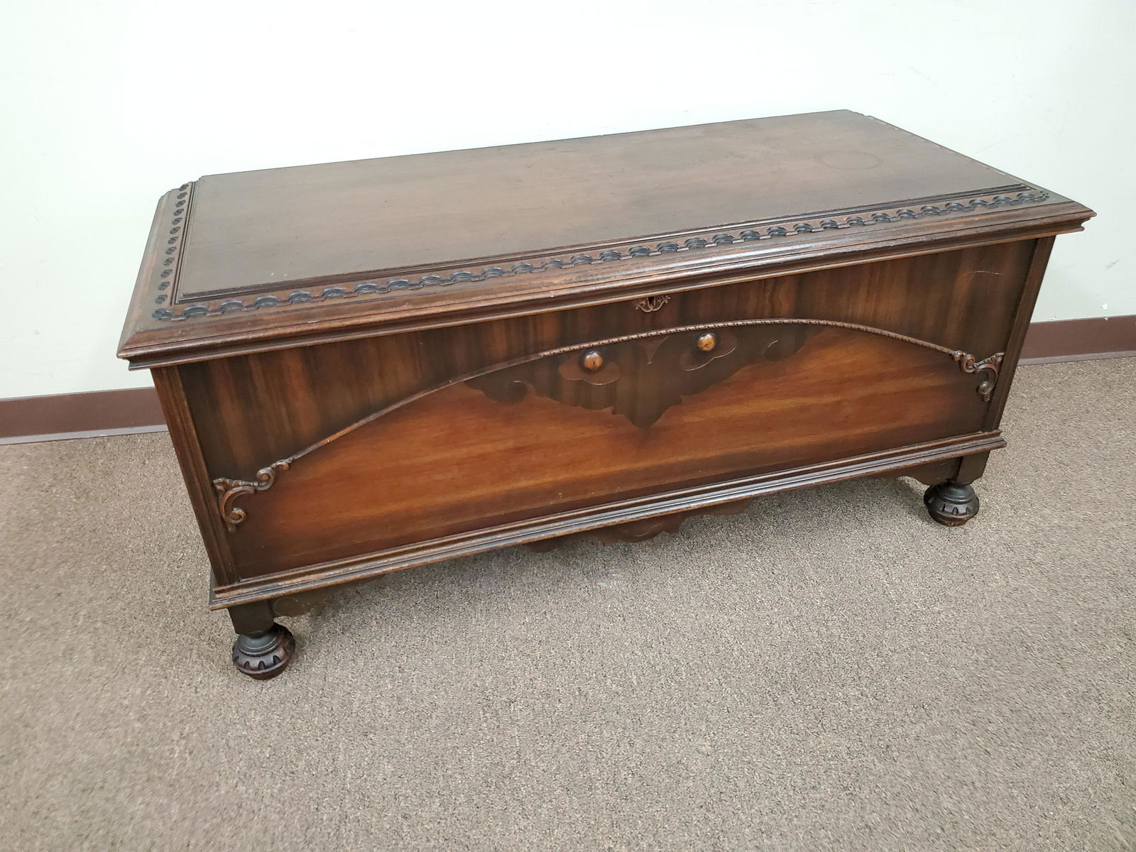 Lane Cedar Chest: 48 1/2" wide X 20" deep X 22 3/4" high. Trim missing on the right side. IMPORTANT: Before bidding, please read the terms and conditions below. When you registered for the auction you agreed to these t